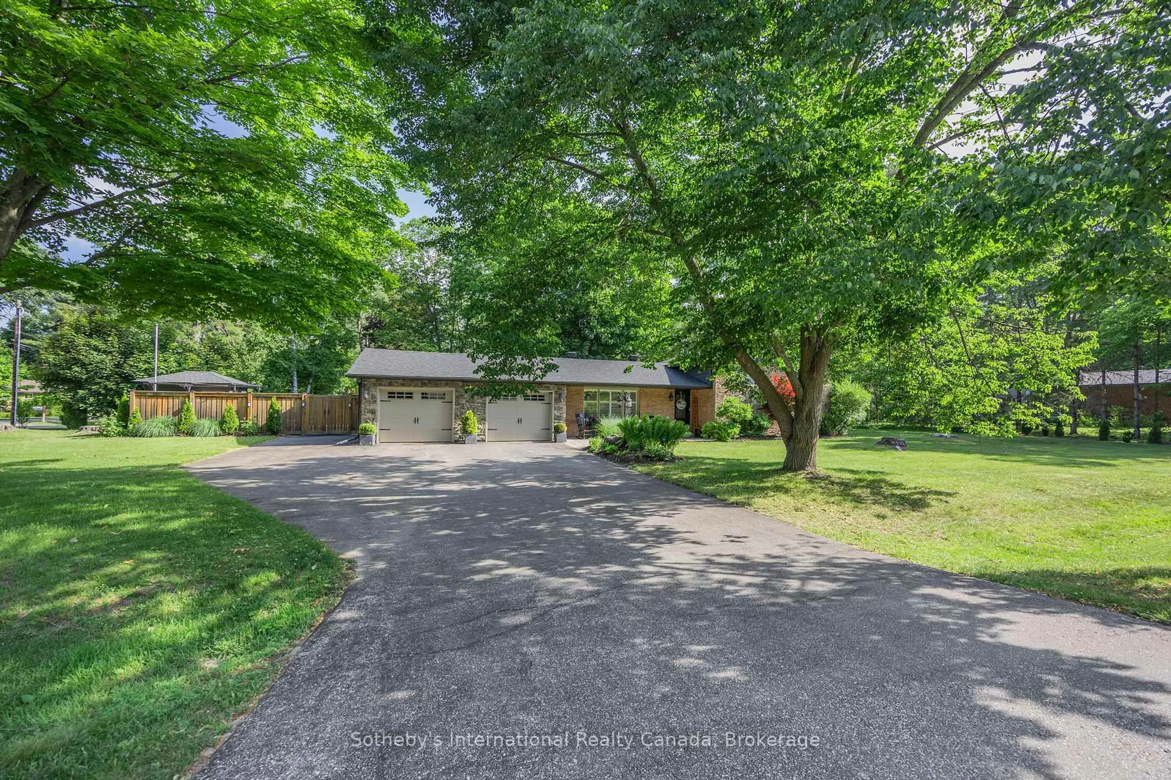 A pic from outside/outdoor area/front of a property/back of a property/a pic from drone, street for 4 Peacher St, Springwater Ontario L0L 1Y2