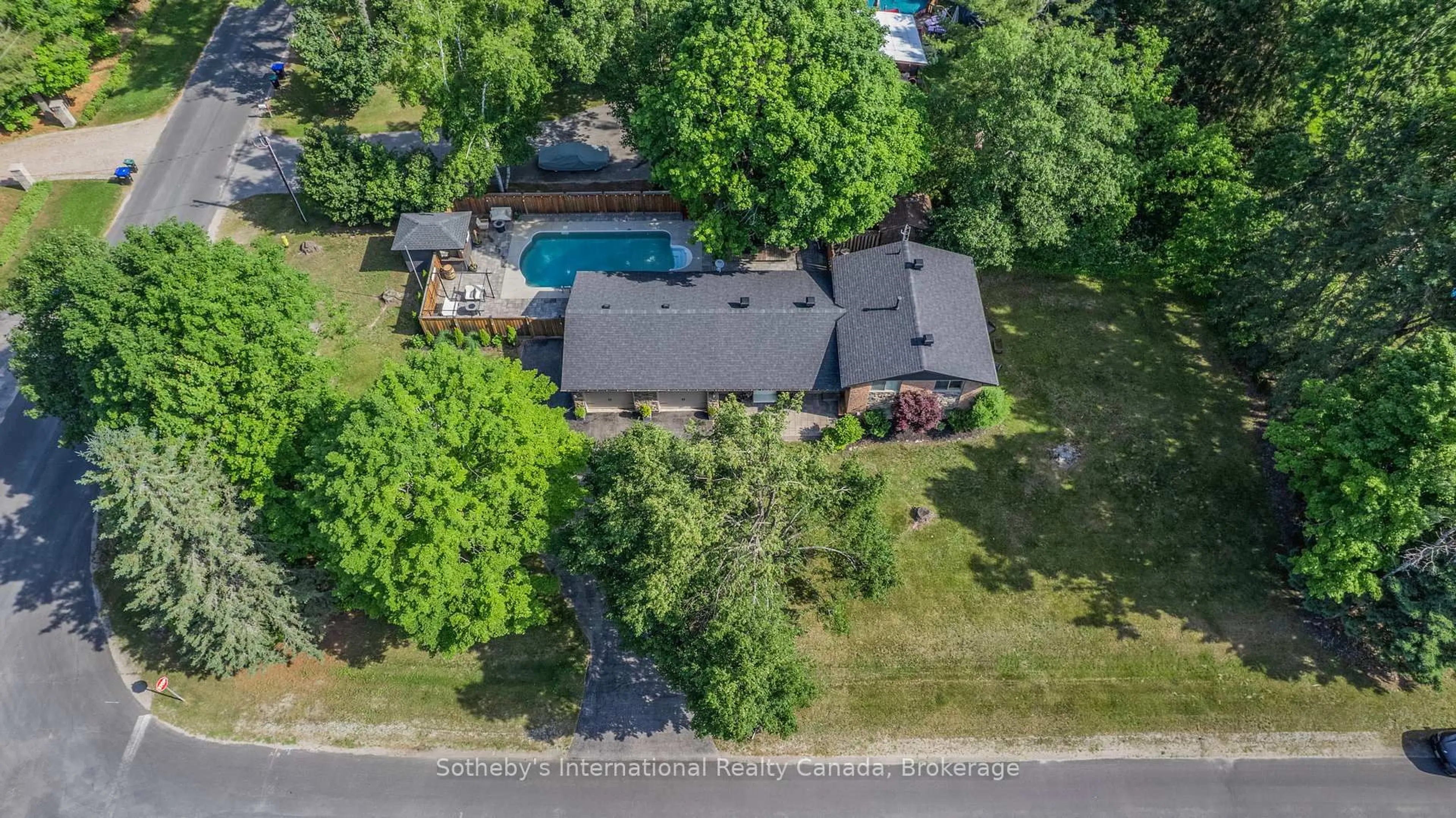 A pic from outside/outdoor area/front of a property/back of a property/a pic from drone, street for 4 Peacher St, Springwater Ontario L0L 1Y2
