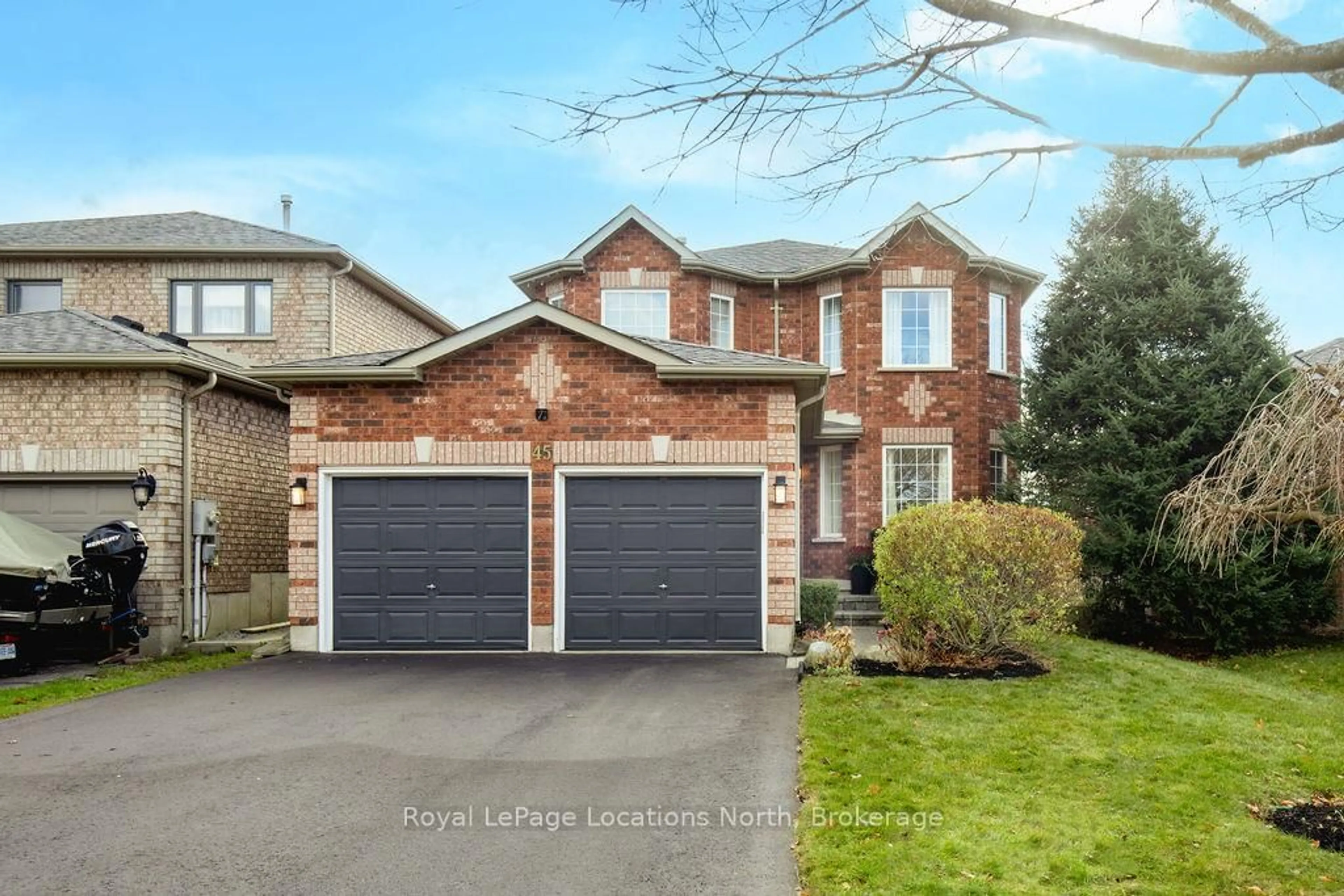 Home with brick exterior material, street for 45 Holly Meadow Rd, Barrie Ontario L4N 0E2