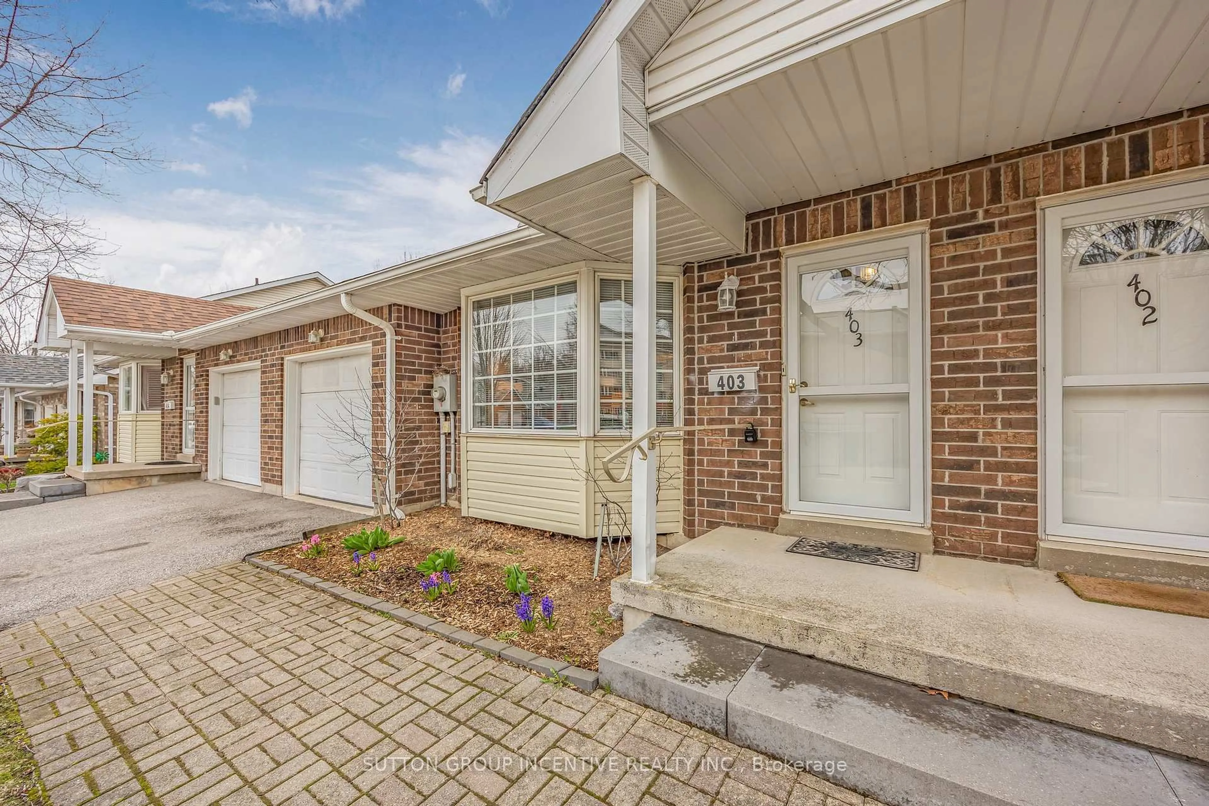 Home with brick exterior material, street for 40 Museum Dr #403, Orillia Ontario L3V 7T9