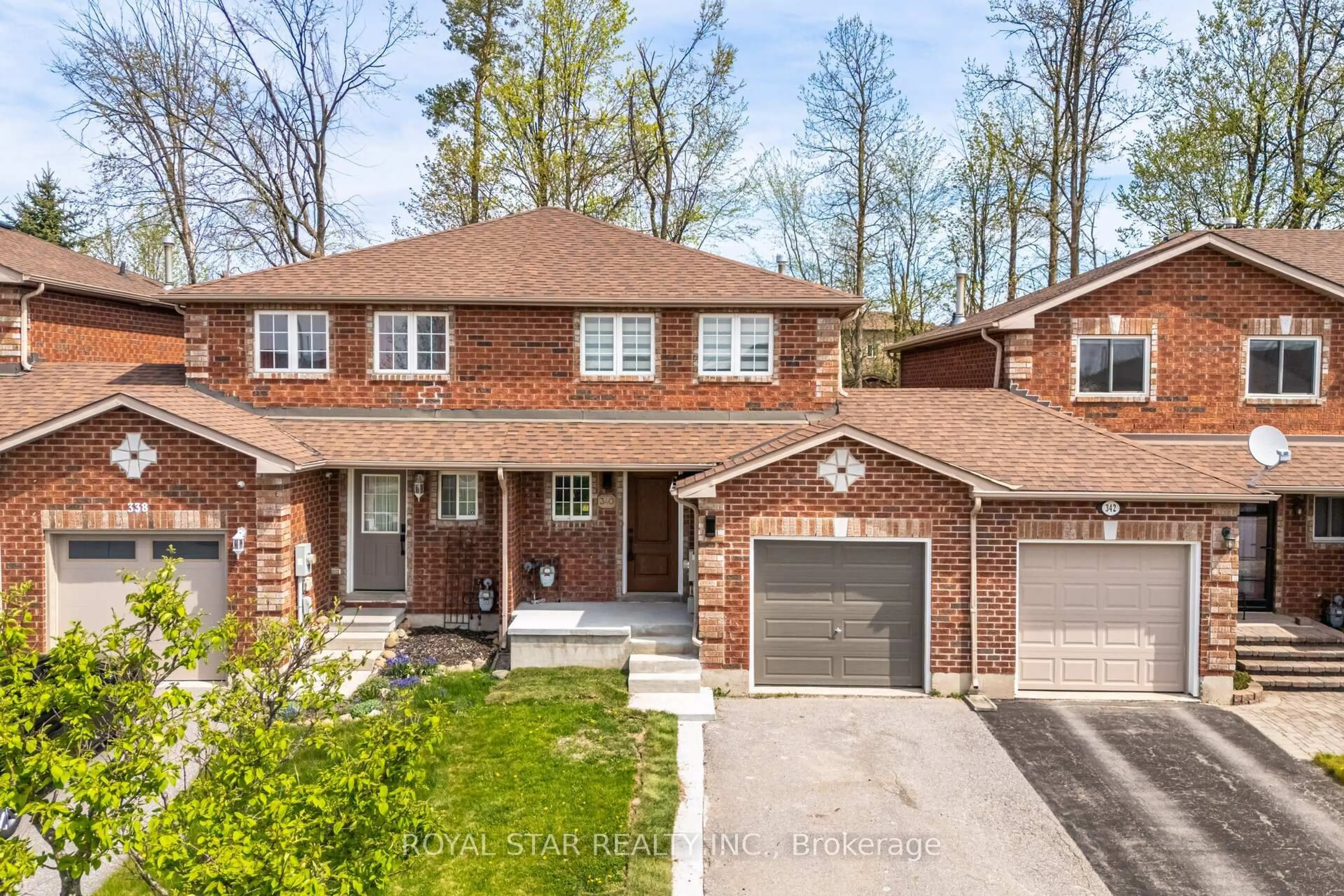 Home with brick exterior material, street for 340 Dunsmore Lane, Barrie Ontario L4M 7B2