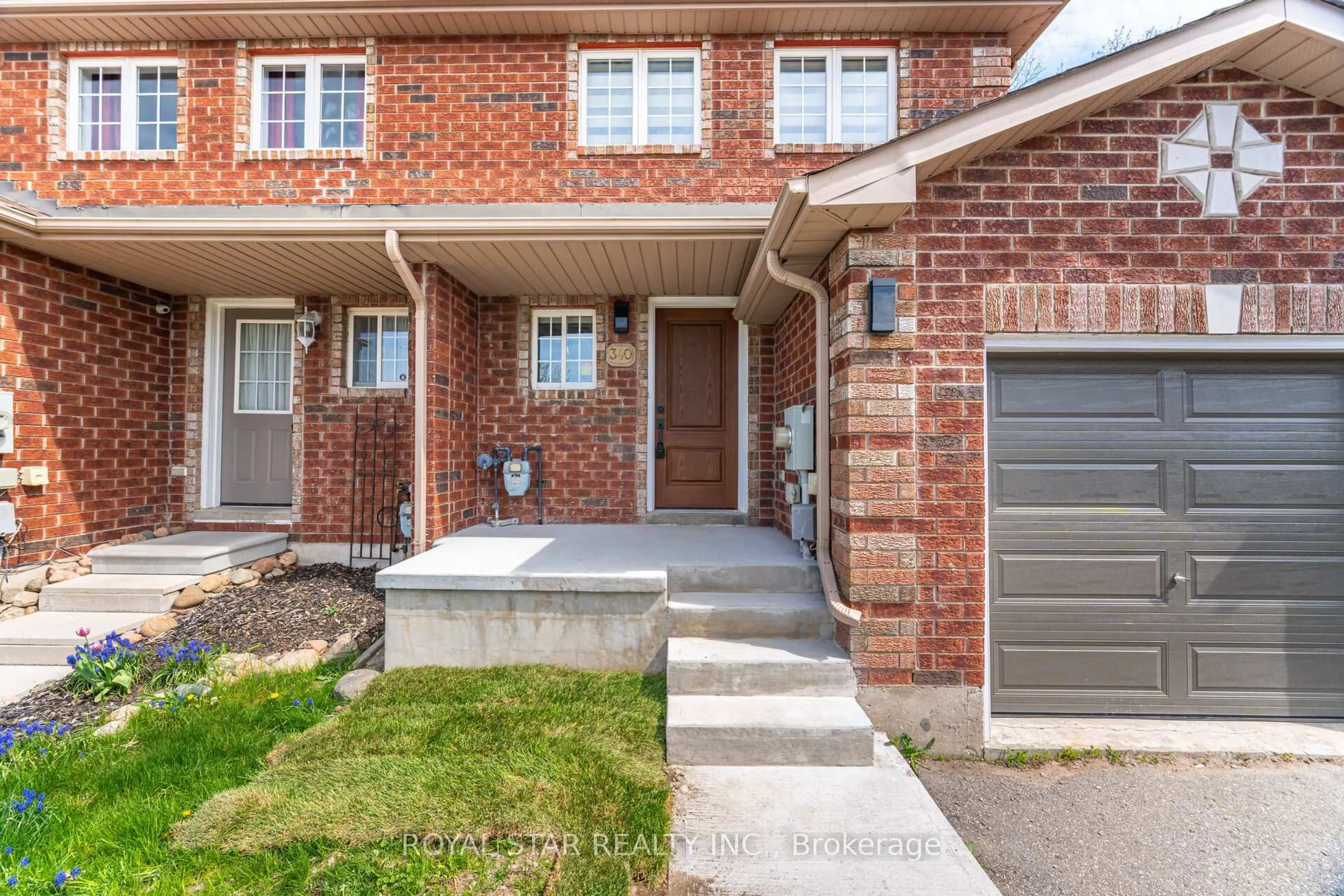 Home with brick exterior material, street for 340 Dunsmore Lane, Barrie Ontario L4M 7B2