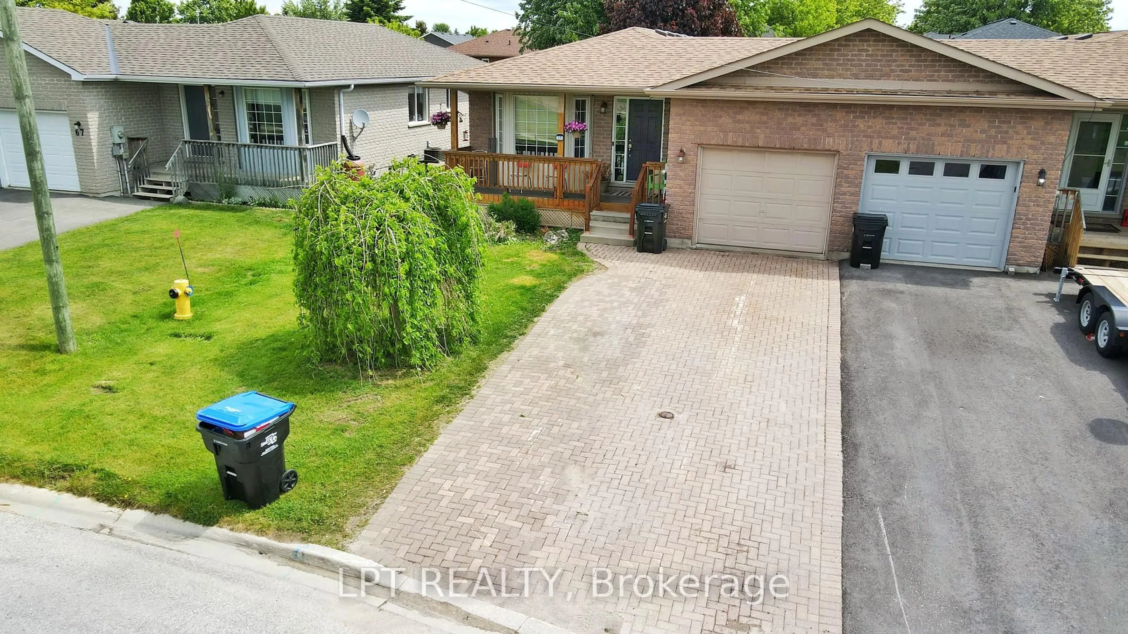A pic from outside/outdoor area/front of a property/back of a property/a pic from drone, street for 69 Simcoe St, Springwater Ontario L0L 1P0