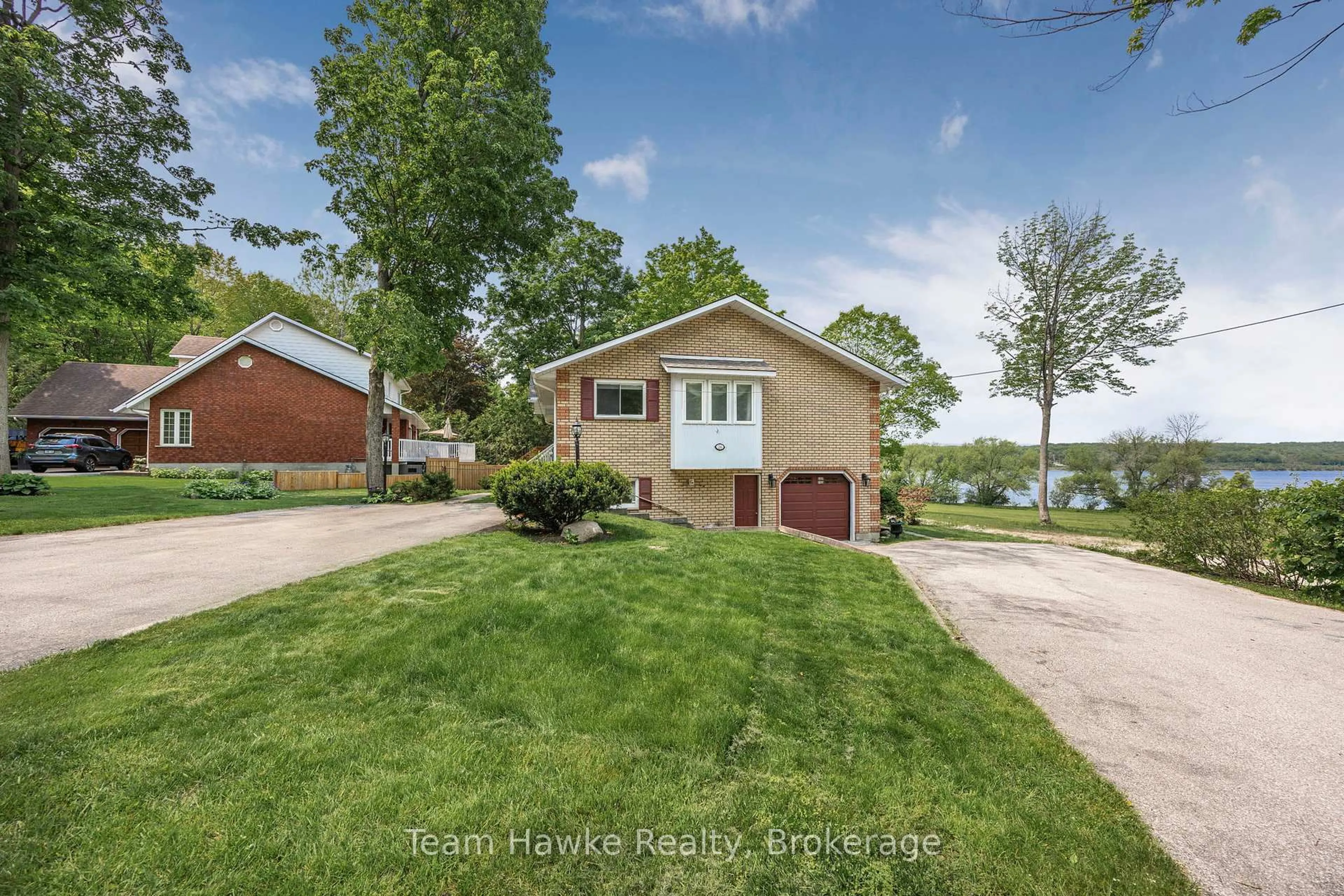 A pic from outside/outdoor area/front of a property/back of a property/a pic from drone, water/lake/river/ocean view for 26 Jury Dr, Penetanguishene Ontario L9M 1G1