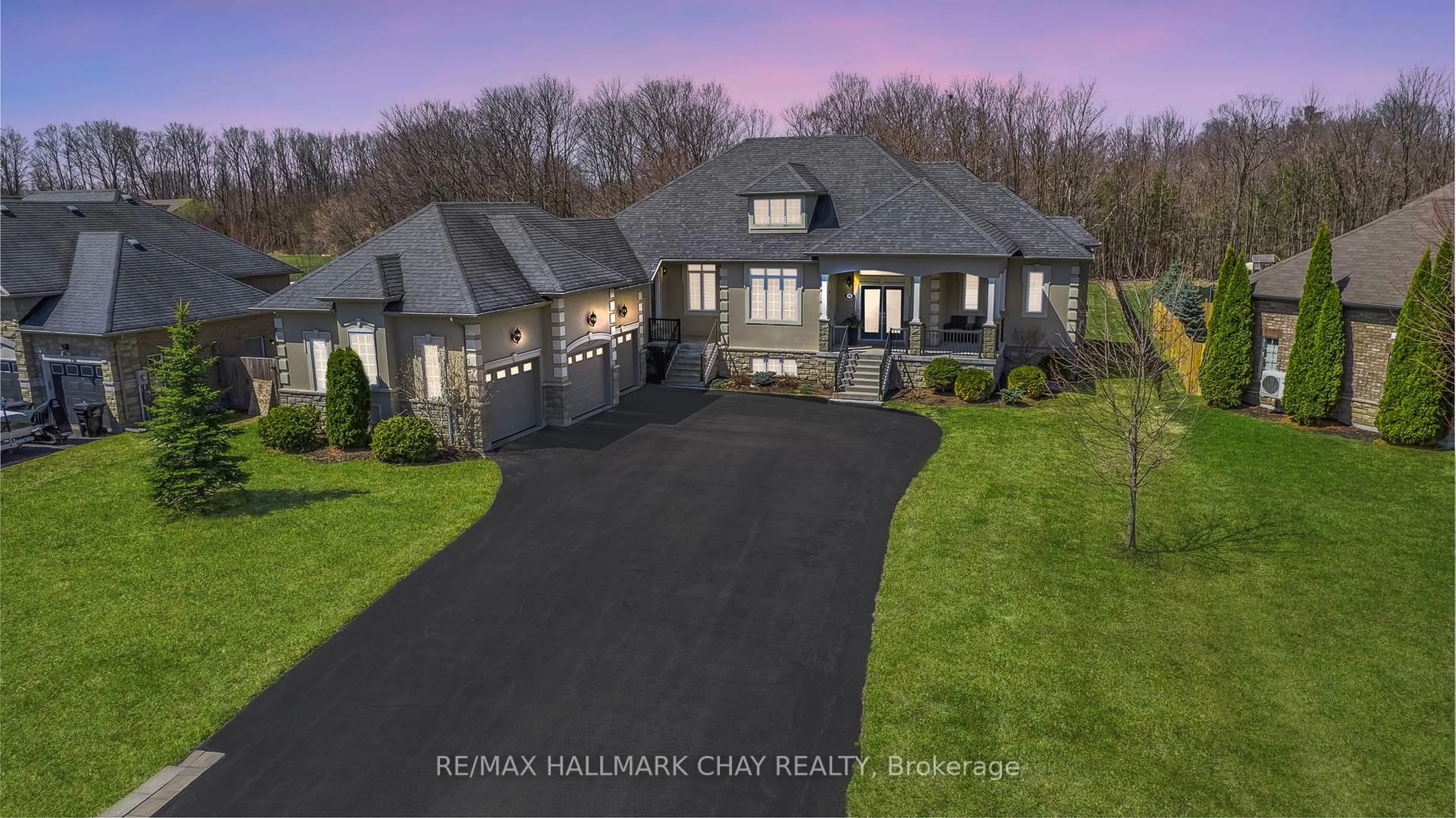 A pic from outside/outdoor area/front of a property/back of a property/a pic from drone, street for 16 Basswood Dr, Wasaga Beach Ontario L9Z 0A9