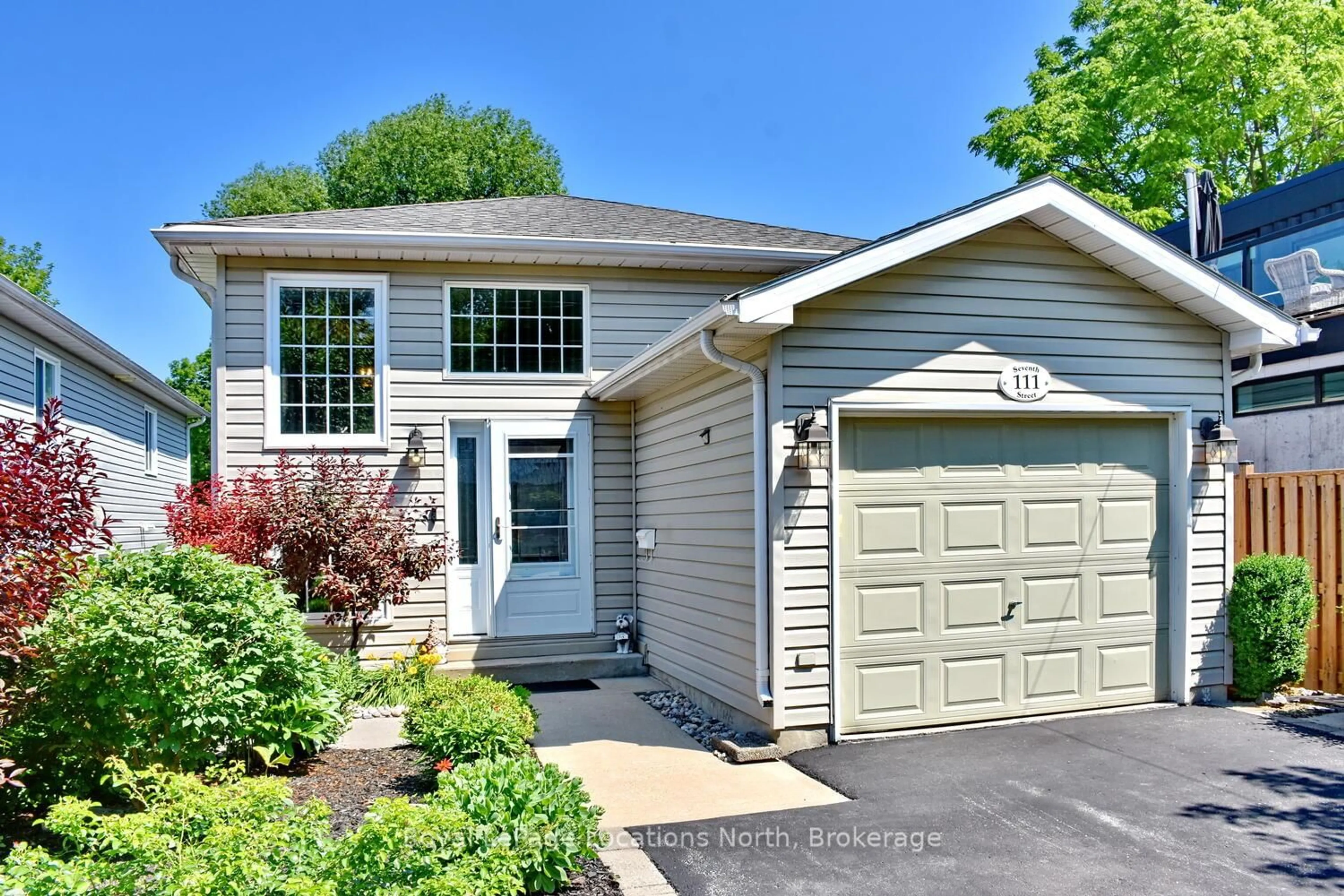 Home with vinyl exterior material, street for 111 Seventh St, Collingwood Ontario L9Y 2B1