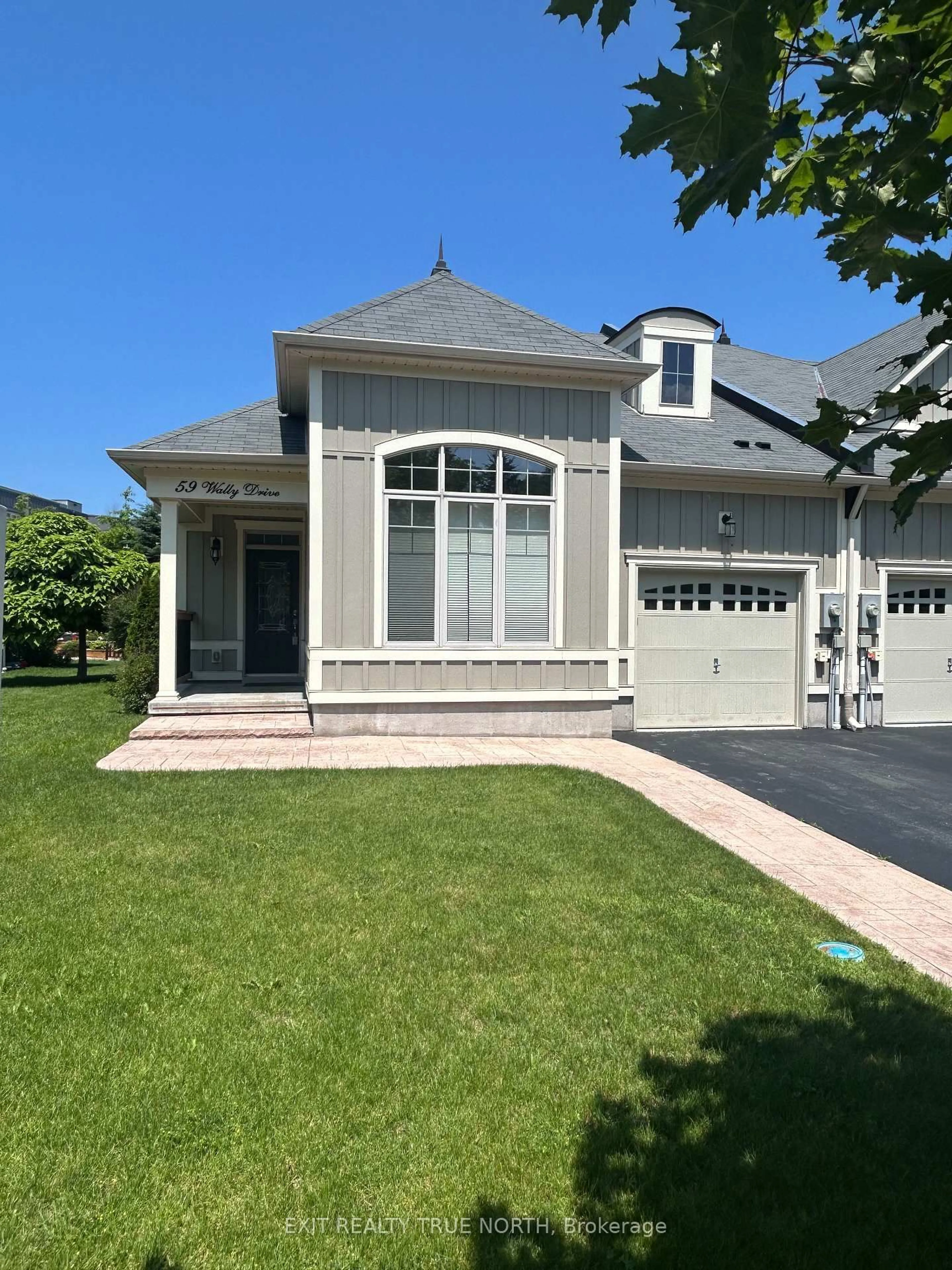 Home with vinyl exterior material, street for 59 Wally Dr, Wasaga Beach Ontario L9Z 0G5