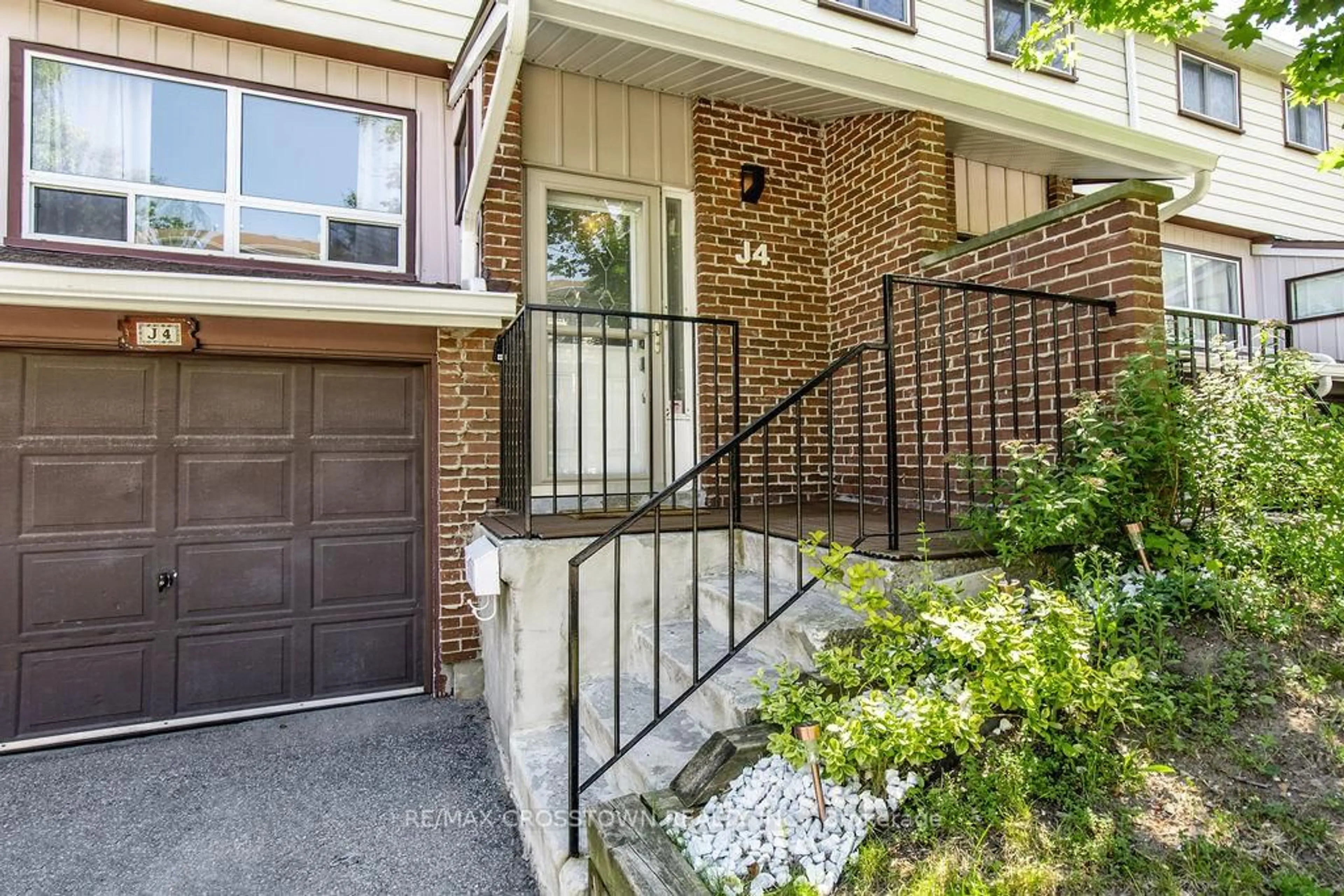 Home with brick exterior material, street for 63 Ferris Lane #J4, Barrie Ontario L4M 5C4