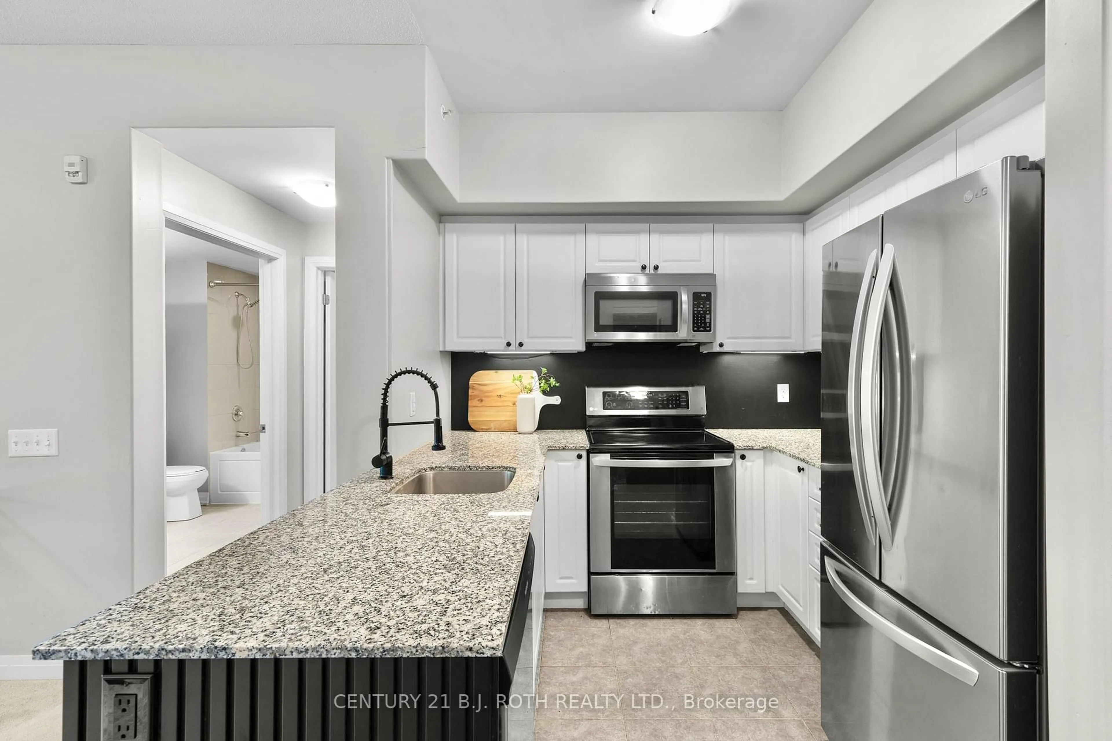 Open concept kitchen, ceramic/tile floor for 300 ESSA Rd #108, Barrie Ontario L9J 0B9