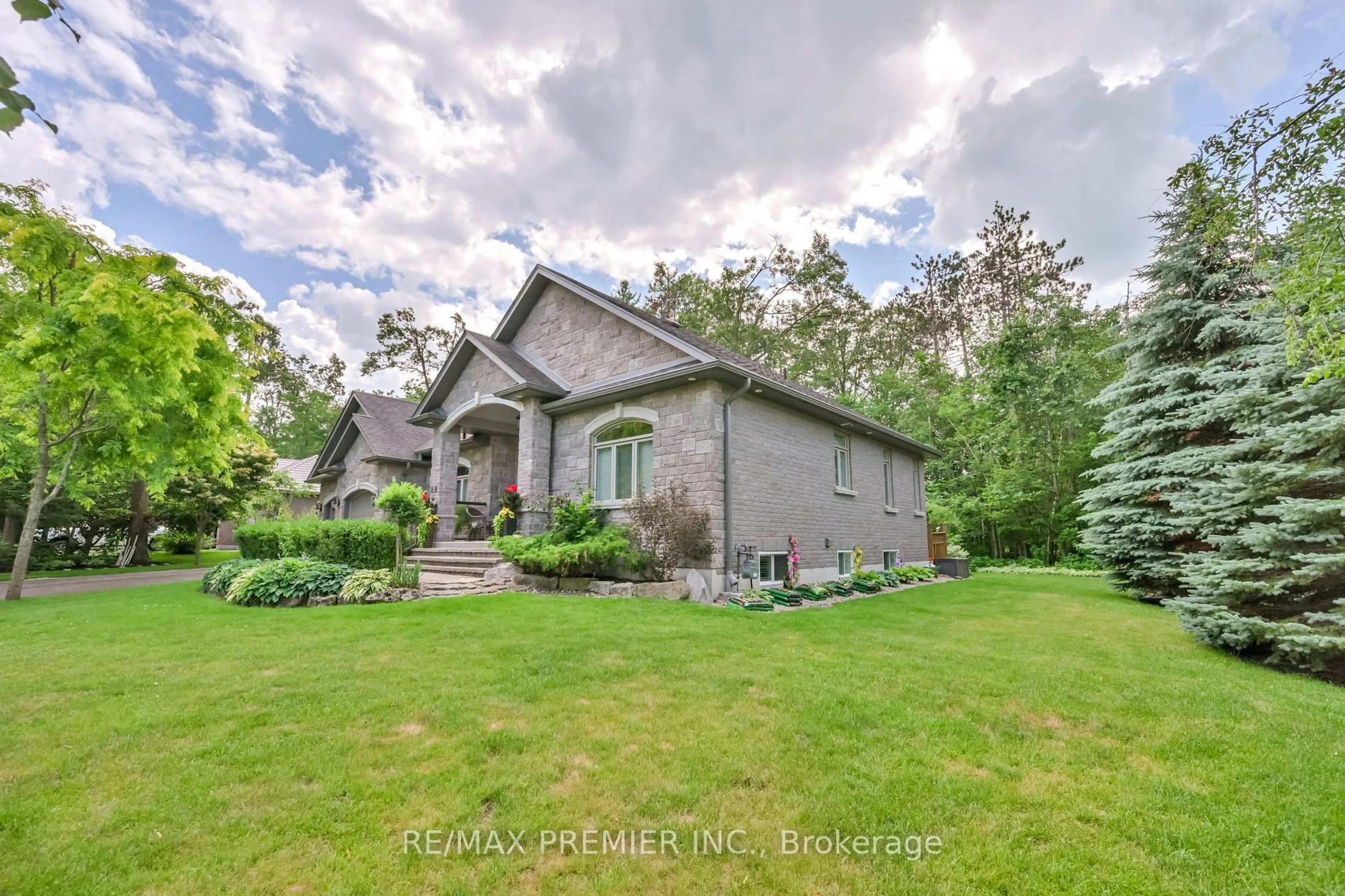 A pic from outside/outdoor area/front of a property/back of a property/a pic from drone, water/lake/river/ocean view for 2 Hilltop Crt, Springwater Ontario L0L 1Y3