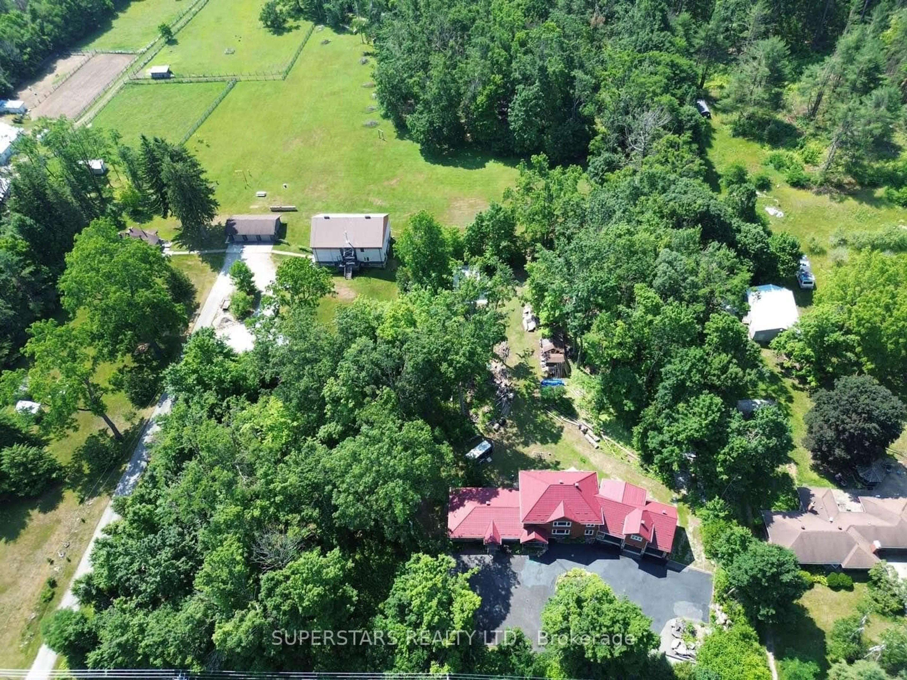 A pic from outside/outdoor area/front of a property/back of a property/a pic from drone, forest/trees view for 1075 Big Bay Point Rd, Barrie Ontario L9J 0A2