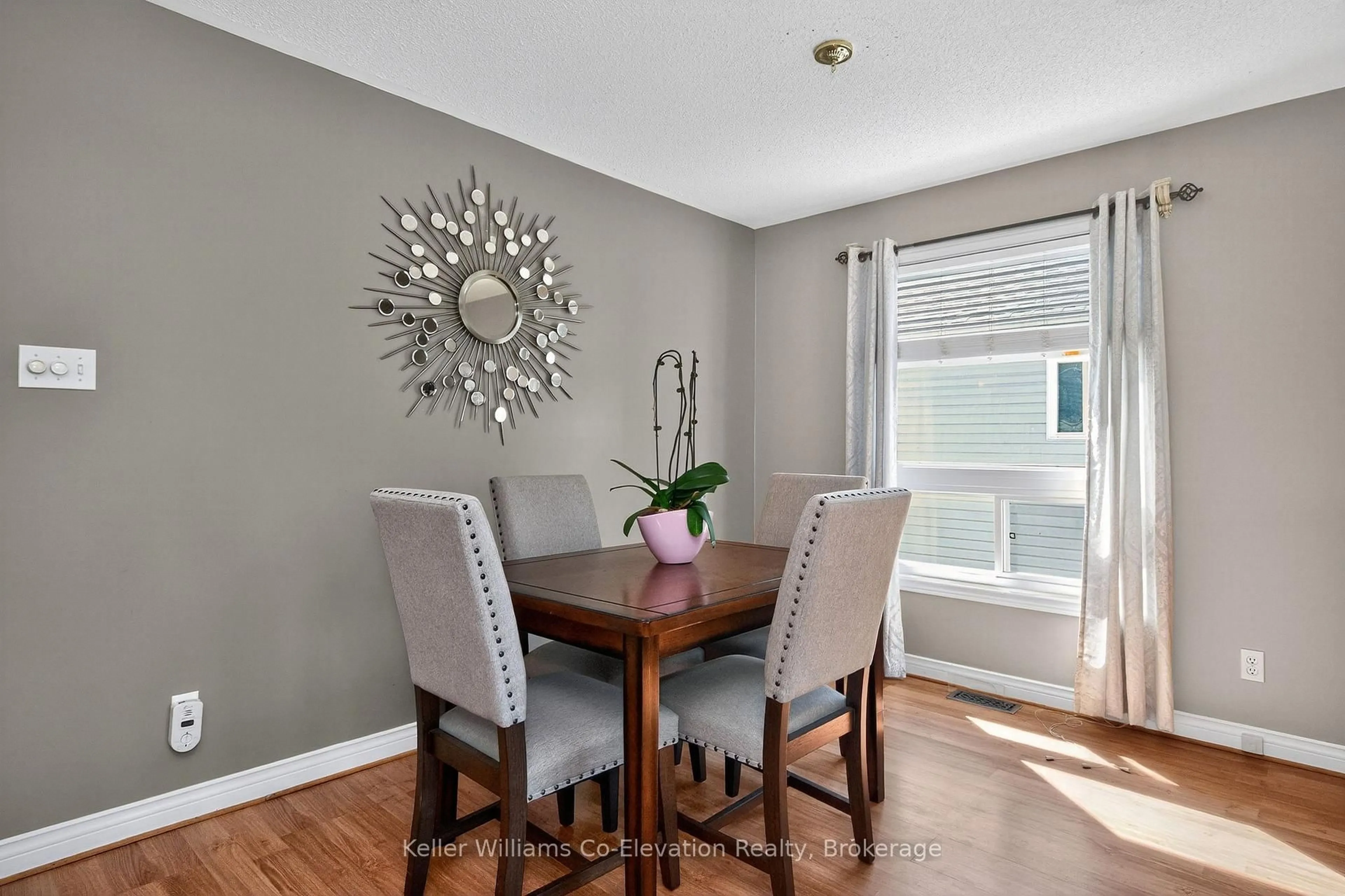 Dining room, wood/laminate floor for 45 Georgia's Walk, Tay Ontario L0K 2A0