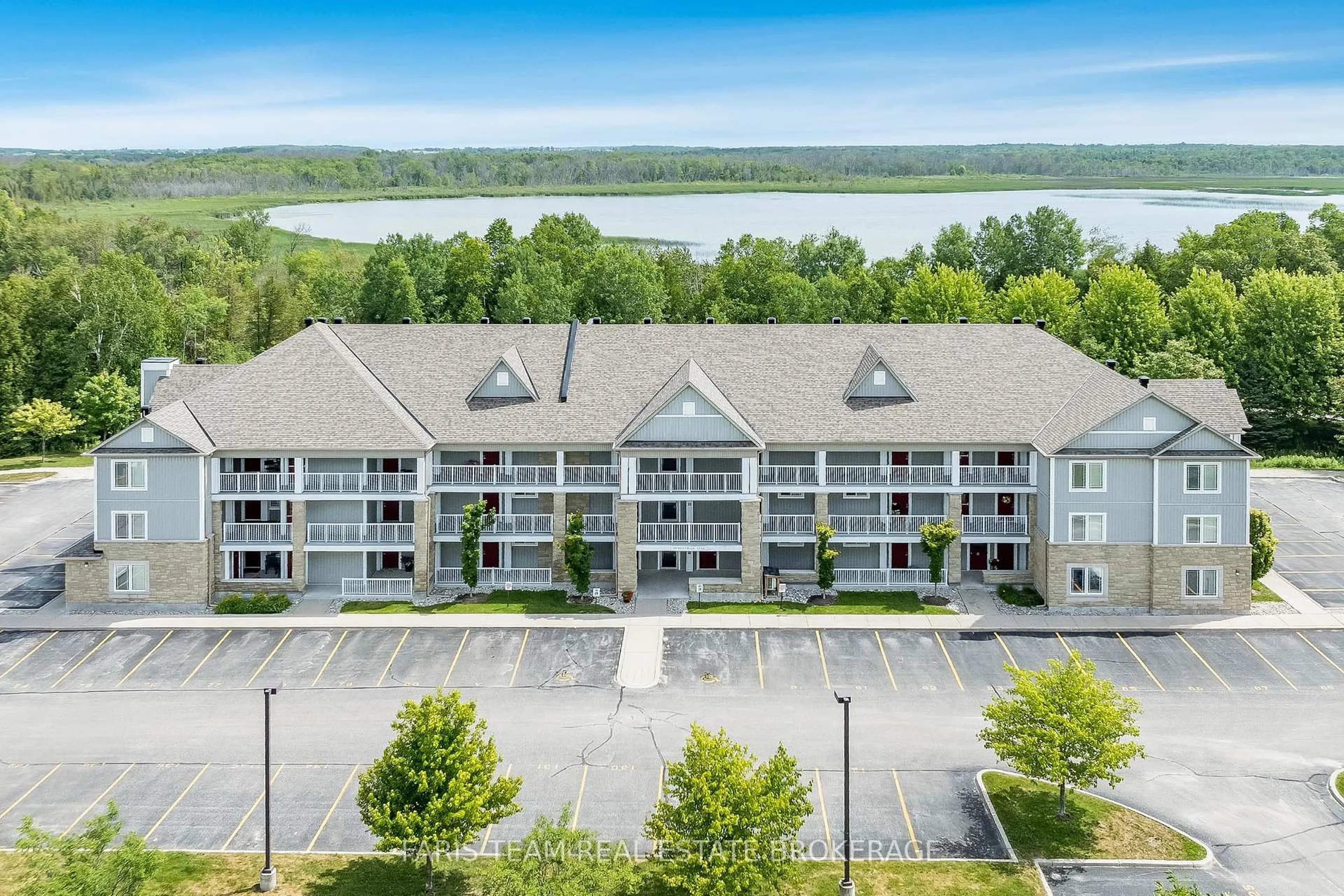 A pic from outside/outdoor area/front of a property/back of a property/a pic from drone, water/lake/river/ocean view for 50 Mulligan Lane #110, Wasaga Beach Ontario L9Z 0C5