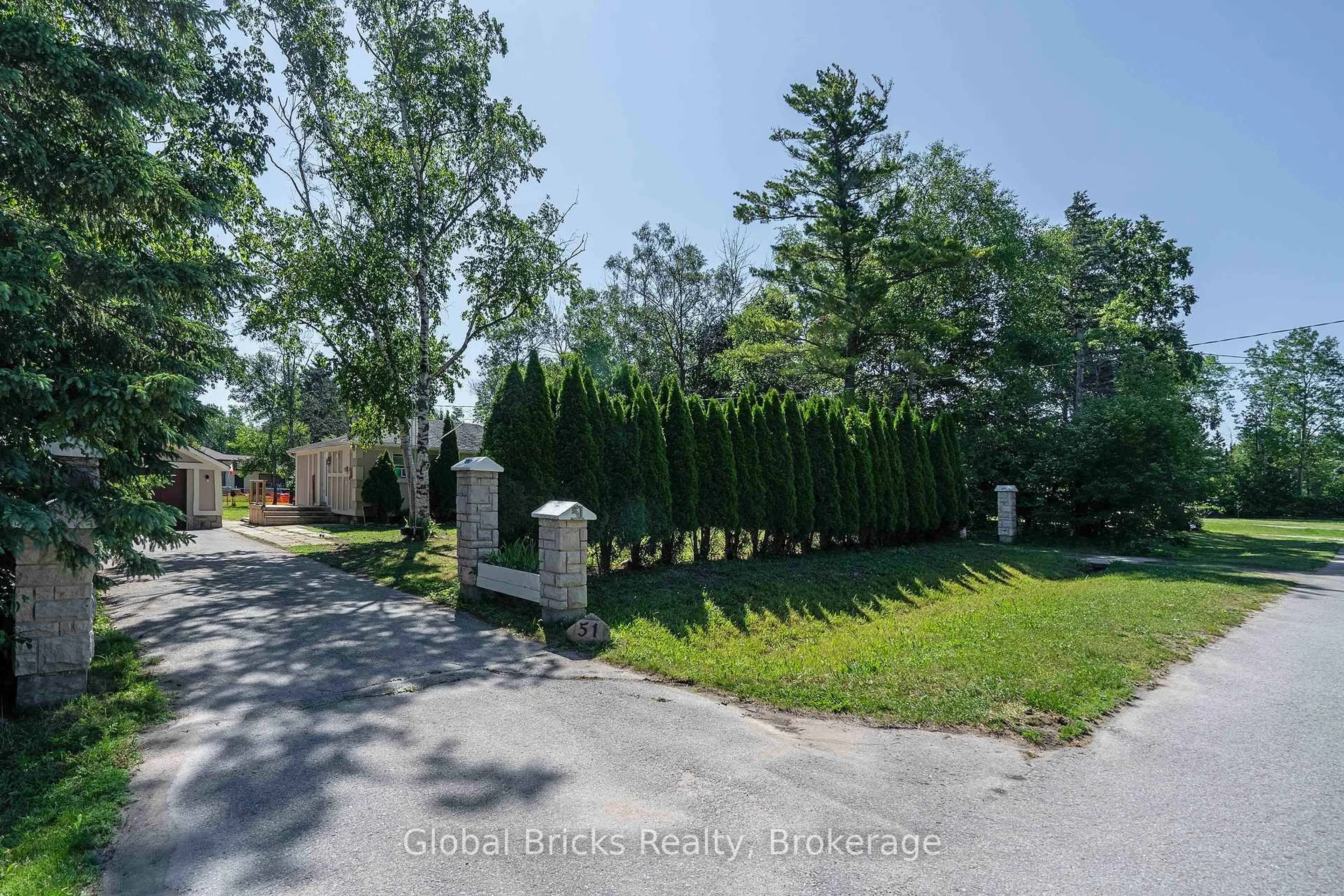 A pic from outside/outdoor area/front of a property/back of a property/a pic from drone, unknown for 51 75th St, Wasaga Beach Ontario L9Z 2G6