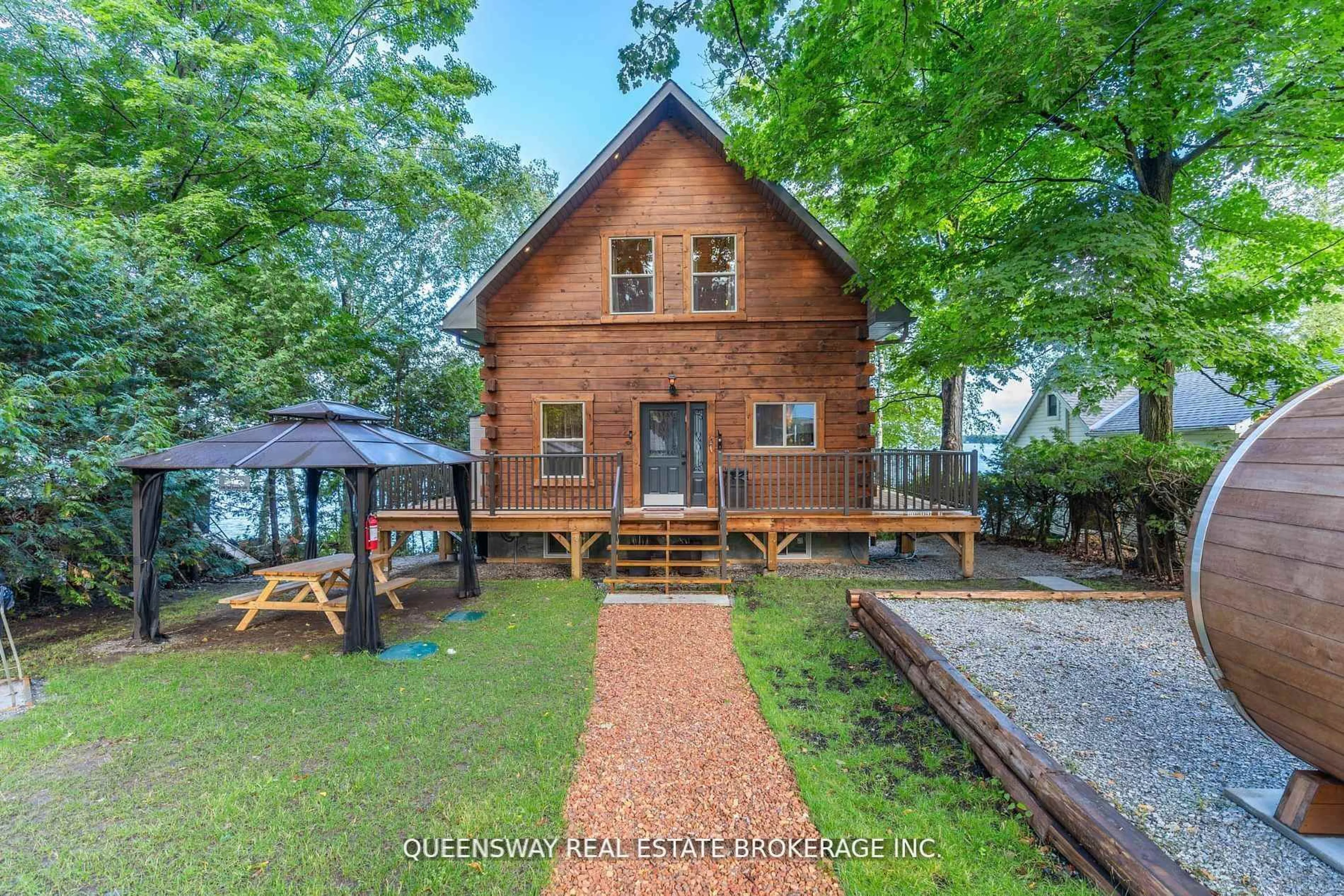 A pic from outside/outdoor area/front of a property/back of a property/a pic from drone, water/lake/river/ocean view for 1280 Black Beach Lane, Ramara Ontario L0K 1B0