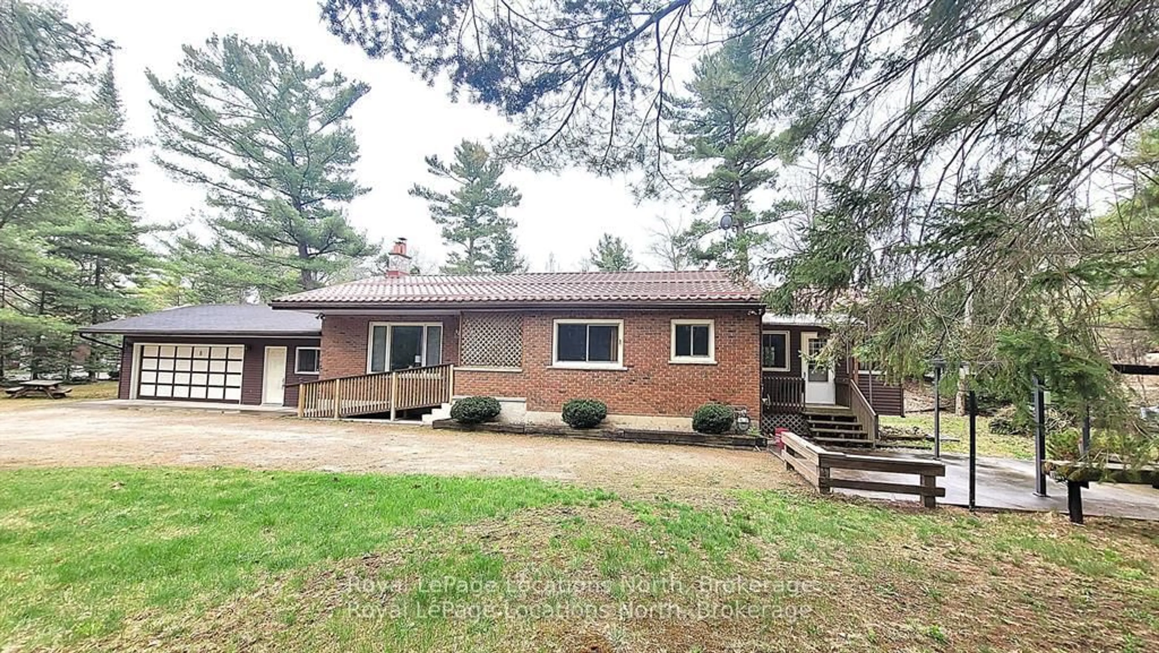 Home with brick exterior material, street for 8 Ronald Ave, Tiny Ontario L0L 1P1