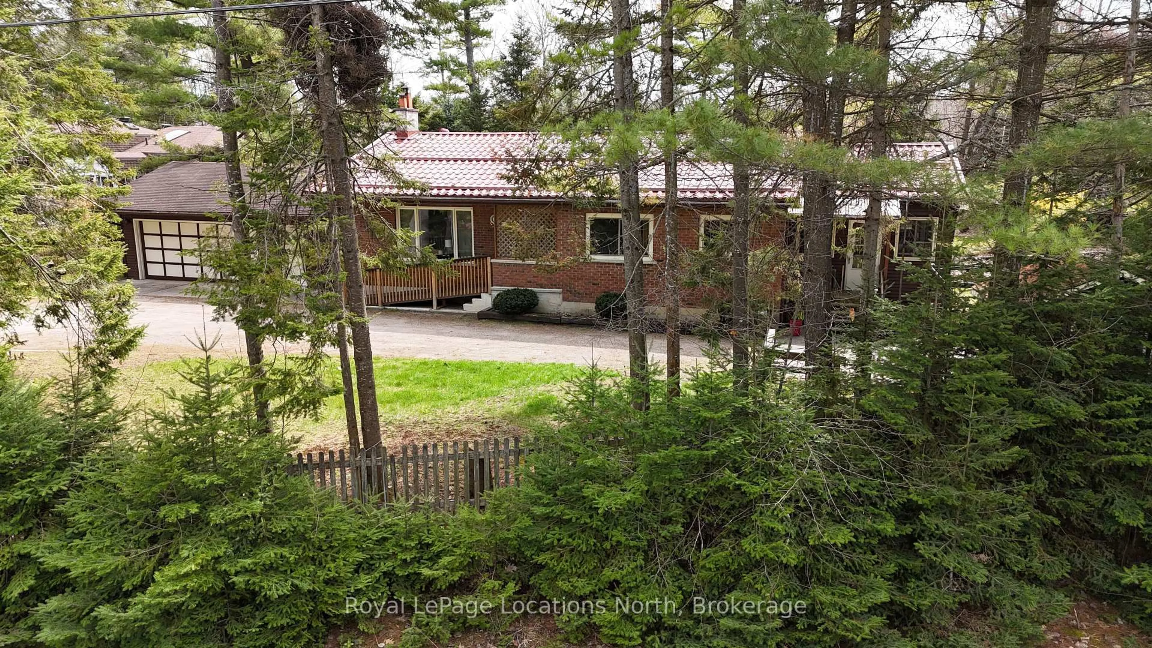 A pic from outside/outdoor area/front of a property/back of a property/a pic from drone, forest/trees view for 8 Ronald Ave, Tiny Ontario L0L 1P1