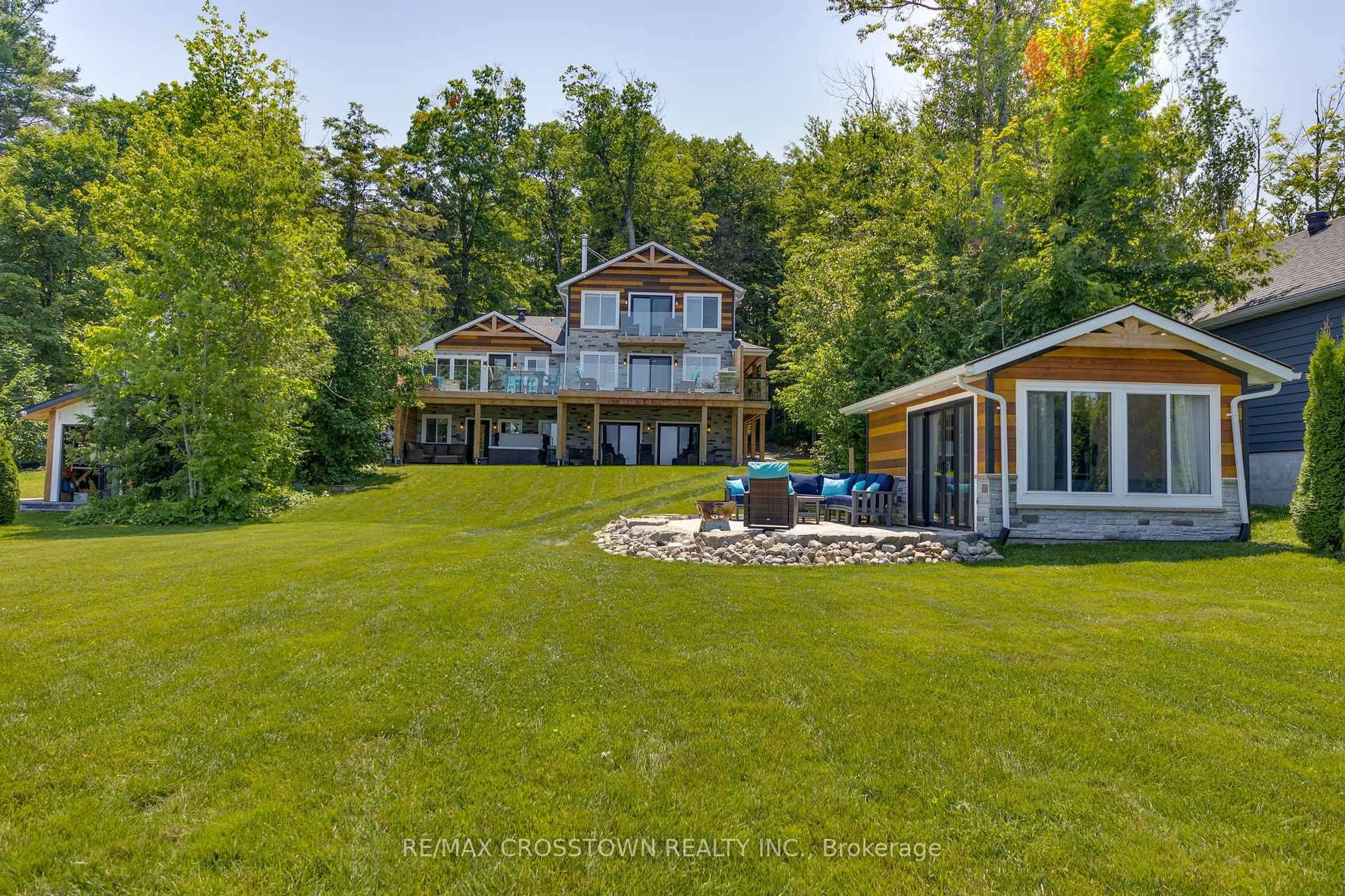 A pic from outside/outdoor area/front of a property/back of a property/a pic from drone, water/lake/river/ocean view for 2216 South Orr Lake Rd, Springwater Ontario L0L 1P0