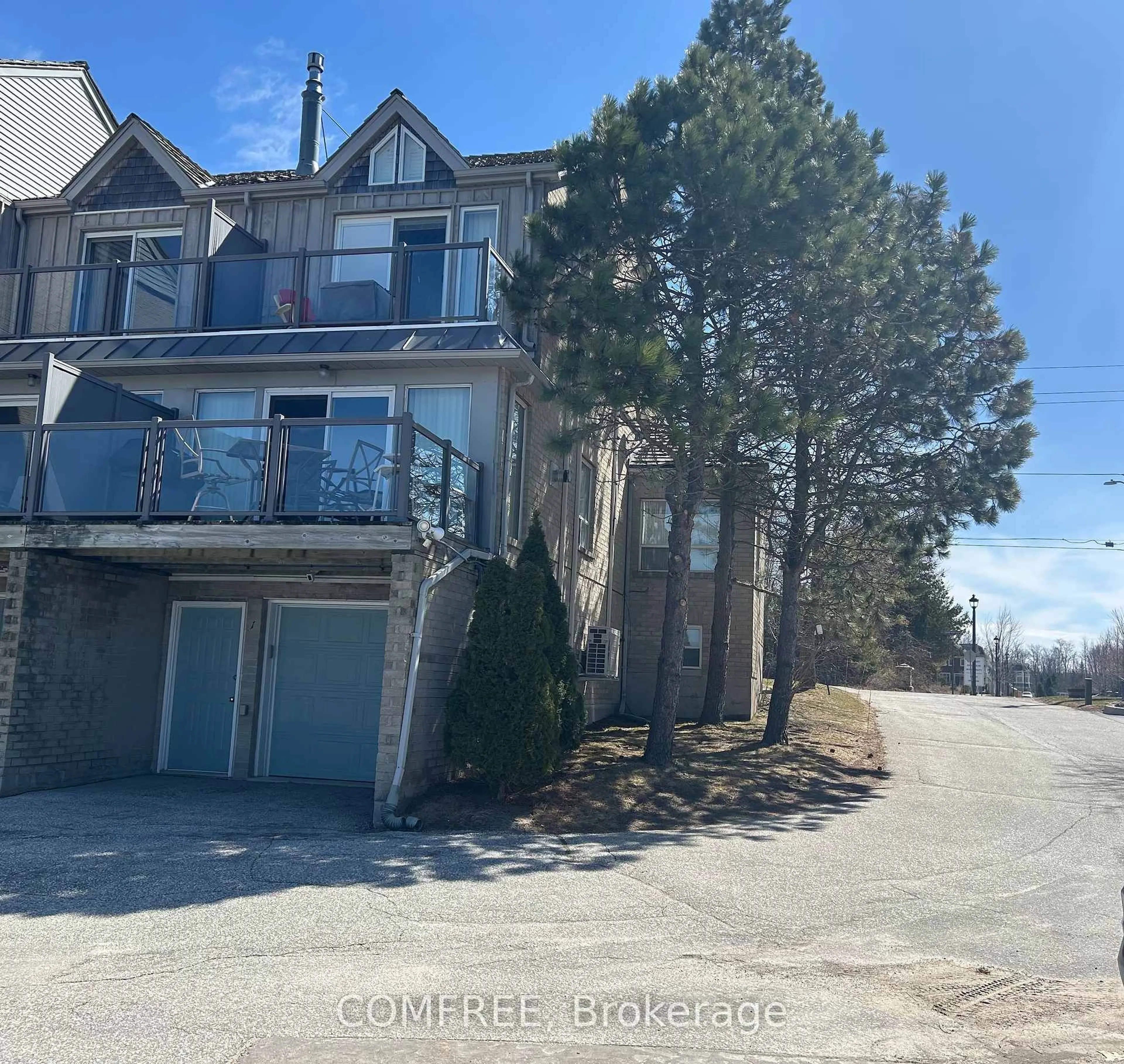 A pic from outside/outdoor area/front of a property/back of a property/a pic from drone, mountain view for 216 River Rd #1, Wasaga Beach Ontario L9Z 2L6