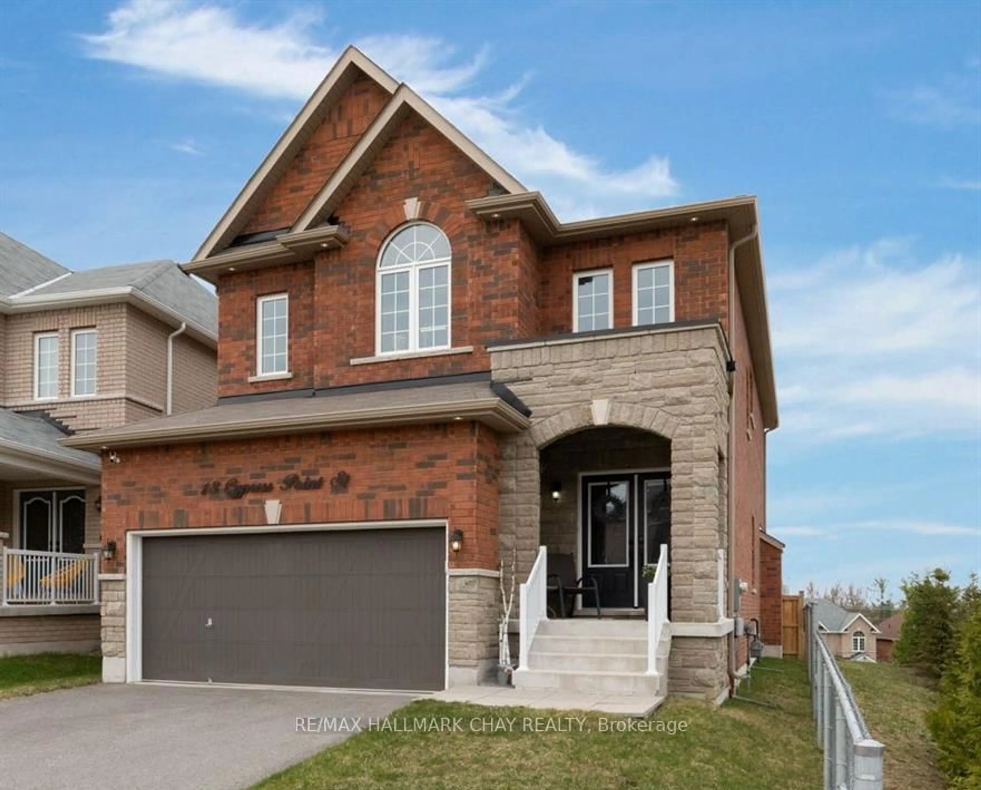 Home with brick exterior material, street for 18 Cypress Point St, Barrie Ontario L4N 6J9