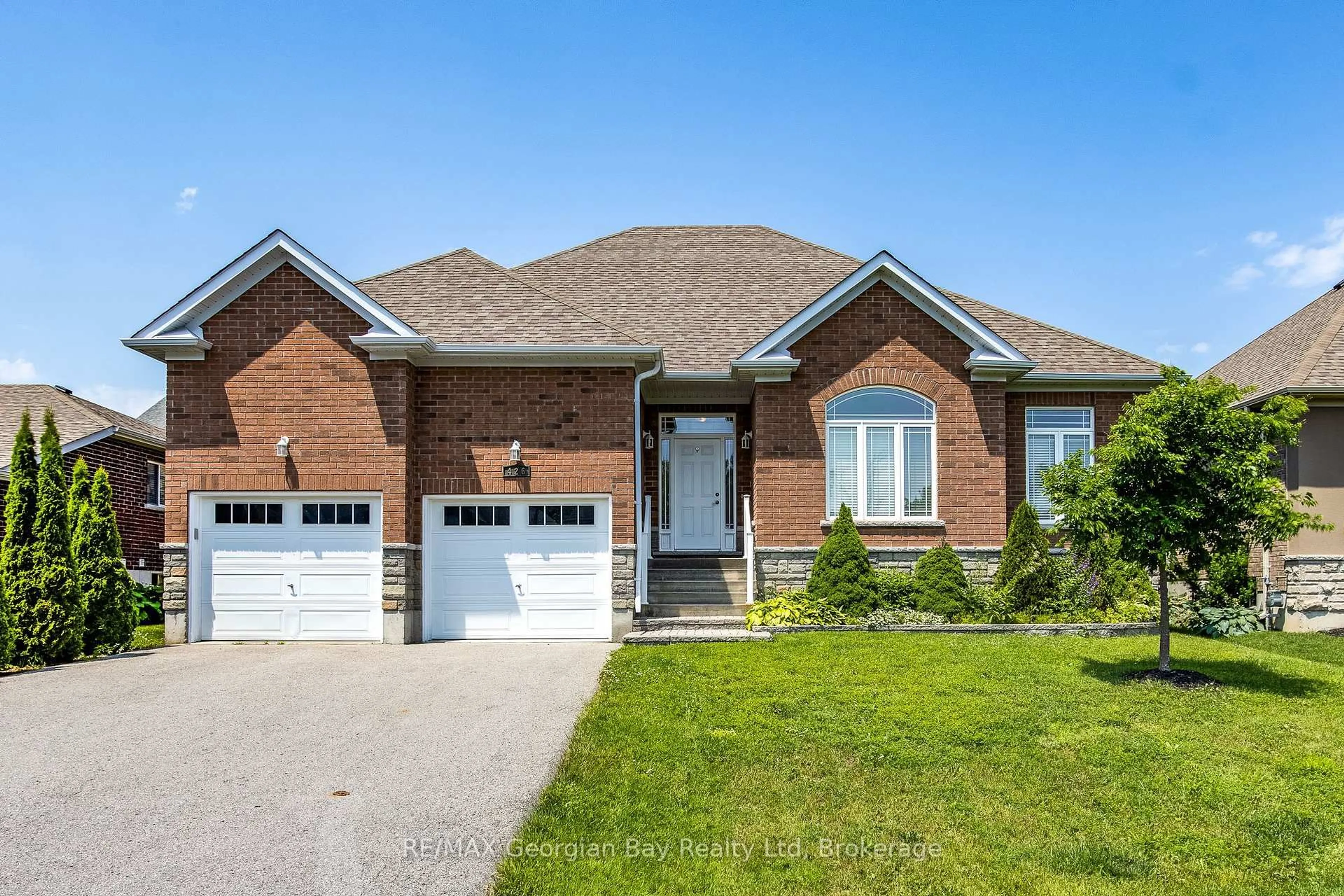 Home with brick exterior material, street for 426 Russ Howard Dr, Midland Ontario L4R 0A6