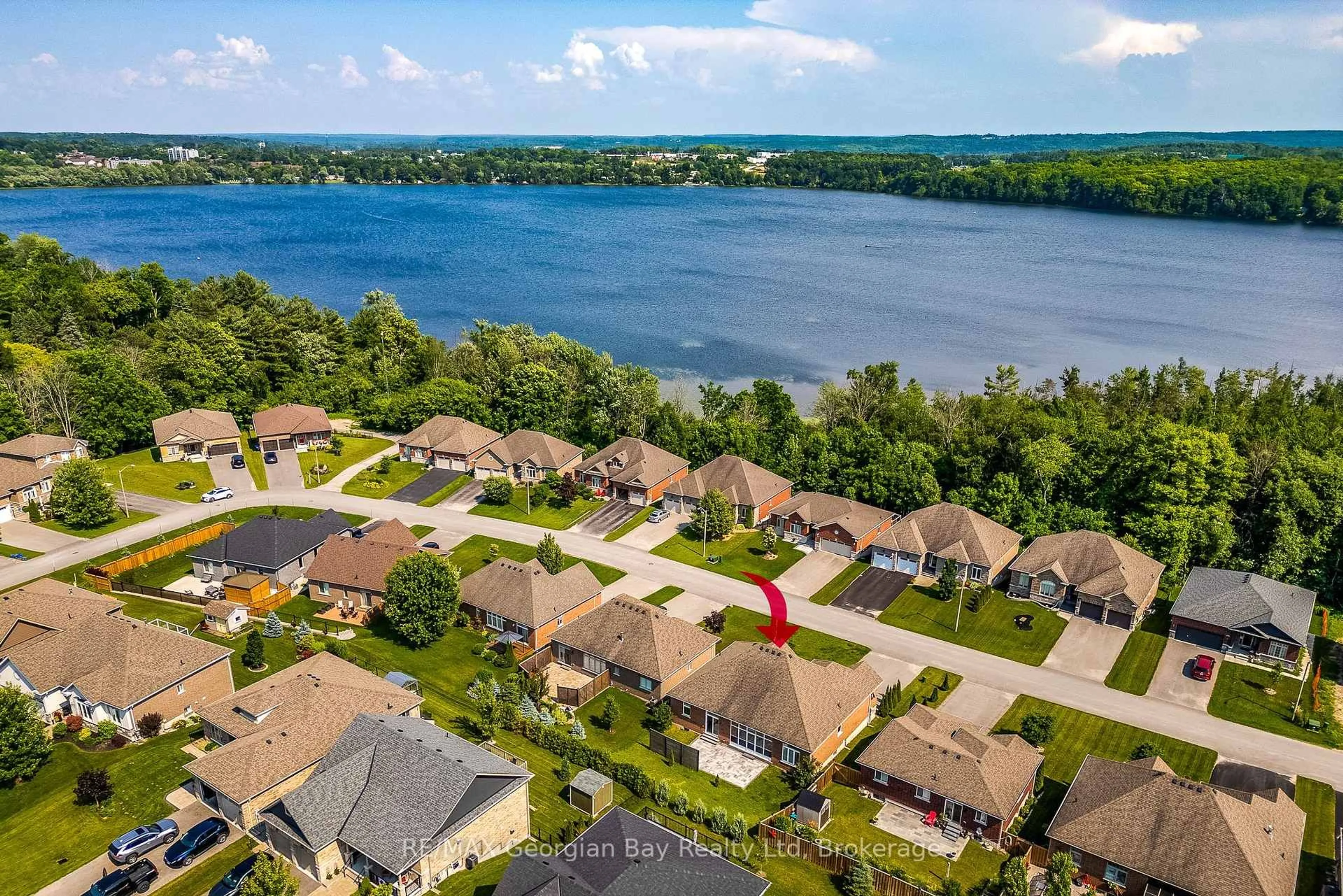 A pic from outside/outdoor area/front of a property/back of a property/a pic from drone, water/lake/river/ocean view for 426 Russ Howard Dr, Midland Ontario L4R 0A6