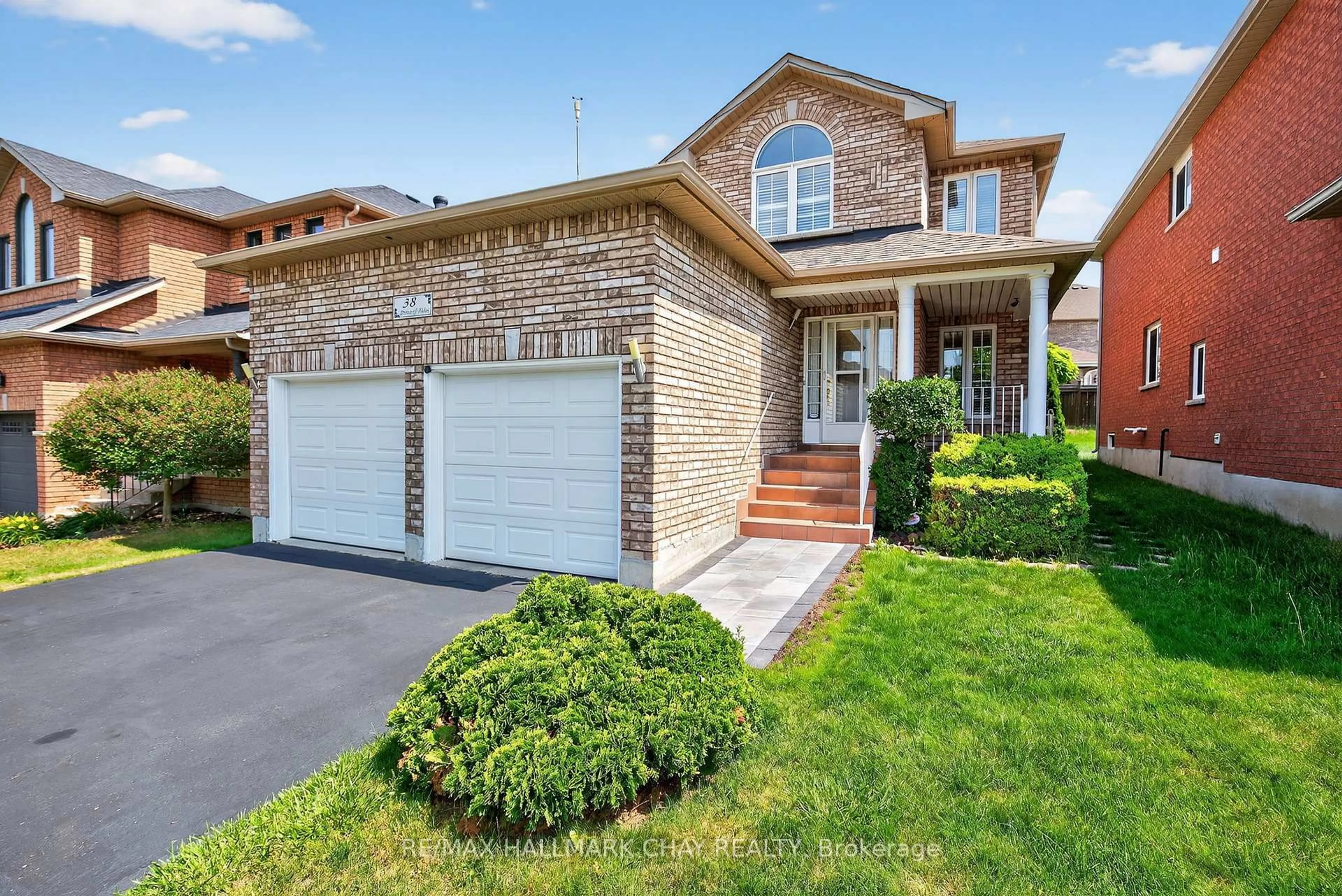 Home with brick exterior material, street for 38 Prince Of Wales Dr, Barrie Ontario L4N 0T1