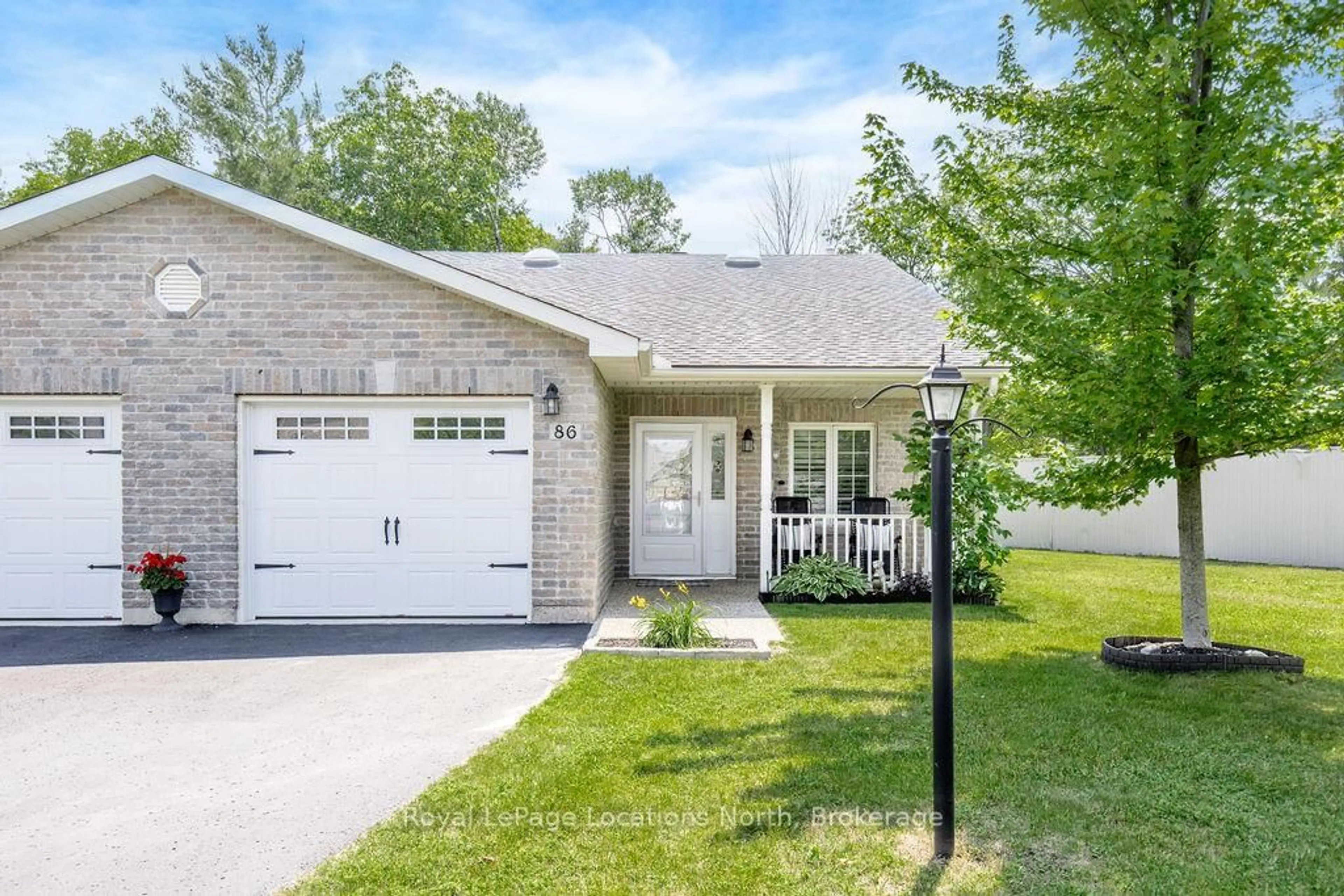 Home with brick exterior material, street for 86 Clover Cres, Wasaga Beach Ontario L9Z 0G4