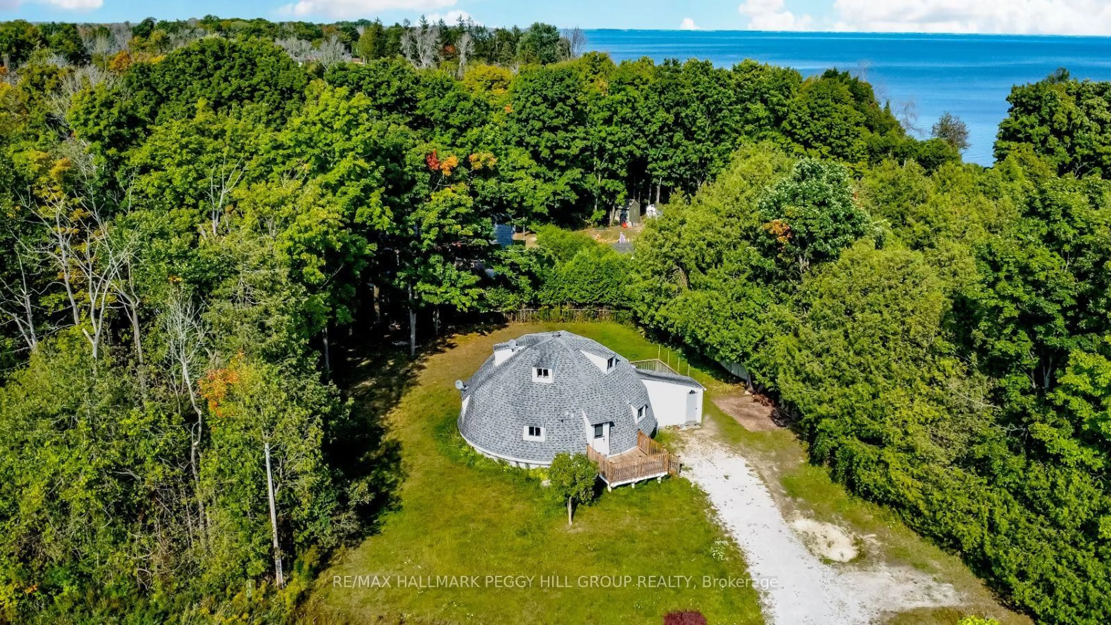 A pic from outside/outdoor area/front of a property/back of a property/a pic from drone, water/lake/river/ocean view for 47 Campbell Ave, Oro-Medonte Ontario L0L 1T0