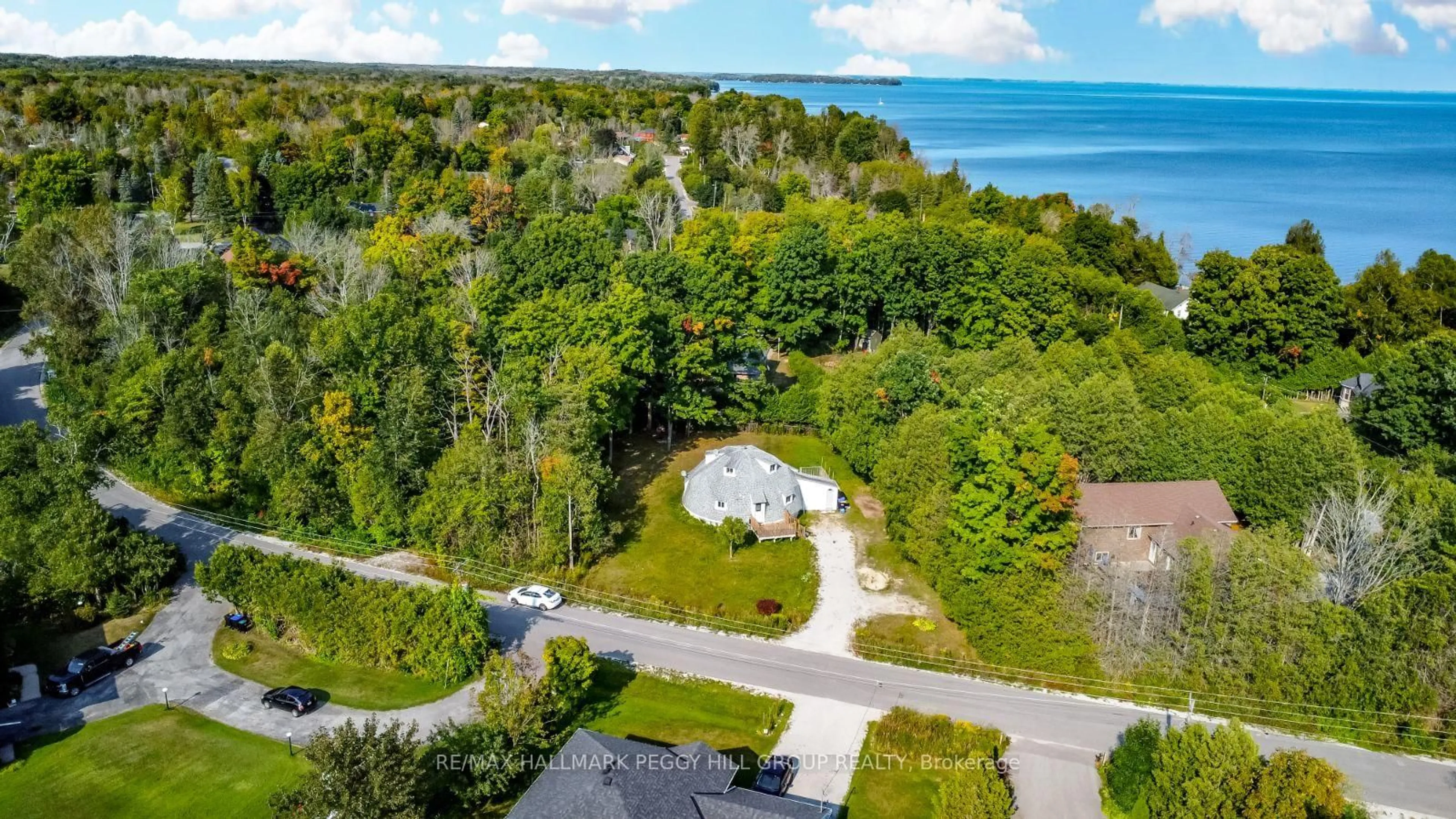 A pic from outside/outdoor area/front of a property/back of a property/a pic from drone, water/lake/river/ocean view for 47 Campbell Ave, Oro-Medonte Ontario L0L 1T0