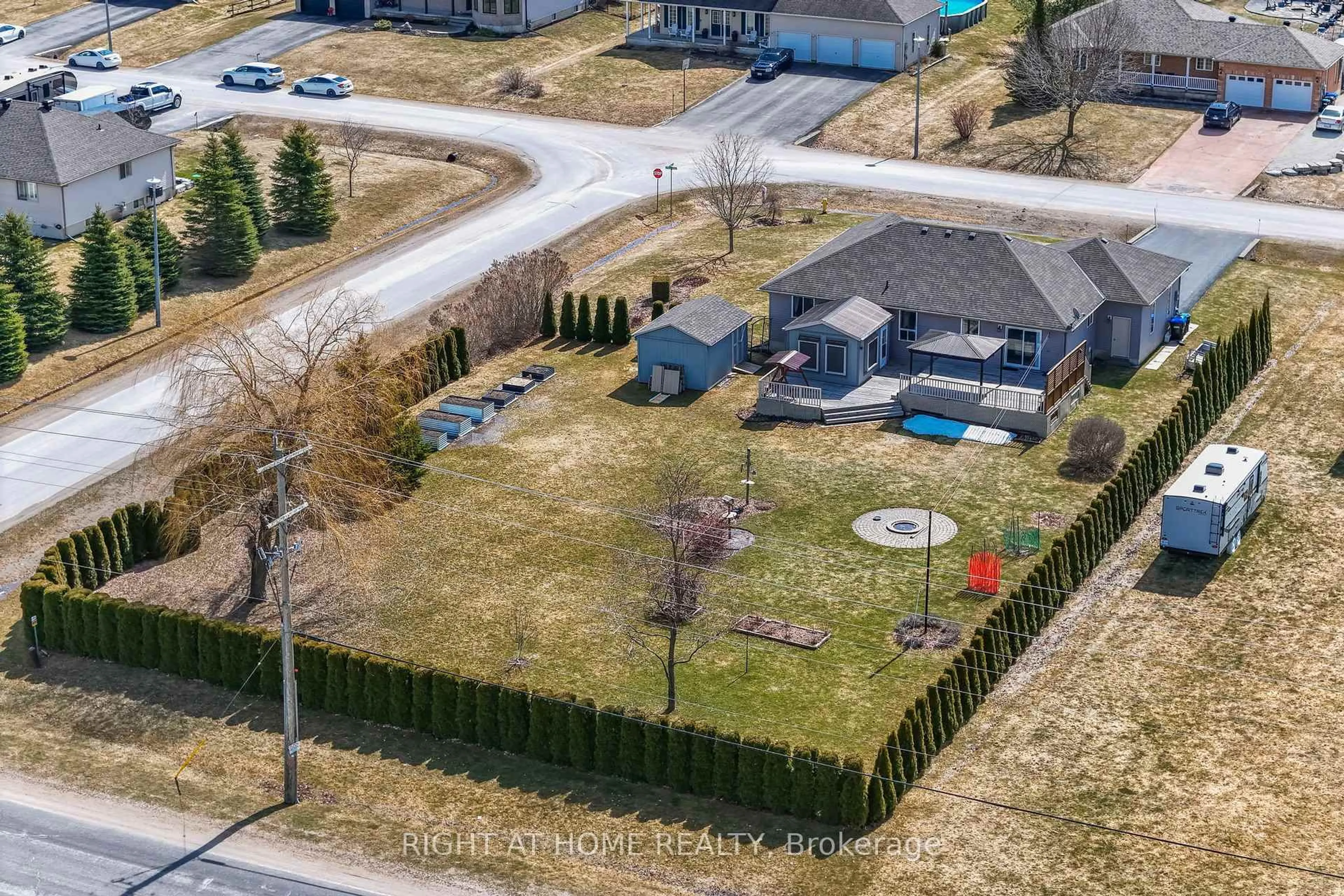 A pic from outside/outdoor area/front of a property/back of a property/a pic from drone, street for 16 O'neill Circ, Springwater Ontario L2L 2K0