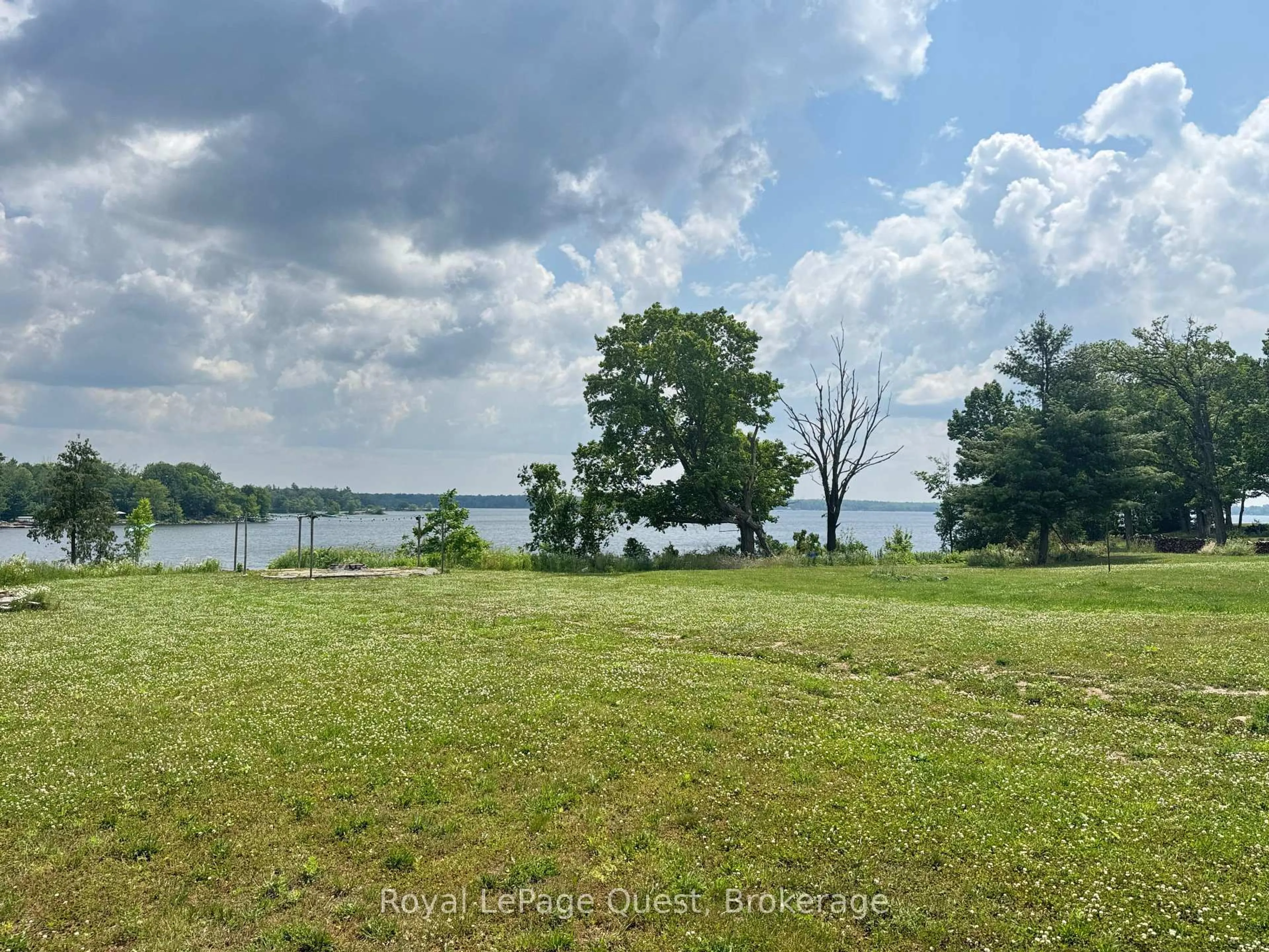 A pic from outside/outdoor area/front of a property/back of a property/a pic from drone, water/lake/river/ocean view for 21 Rosy Beach Crt, Ramara Ontario L3V 8L2