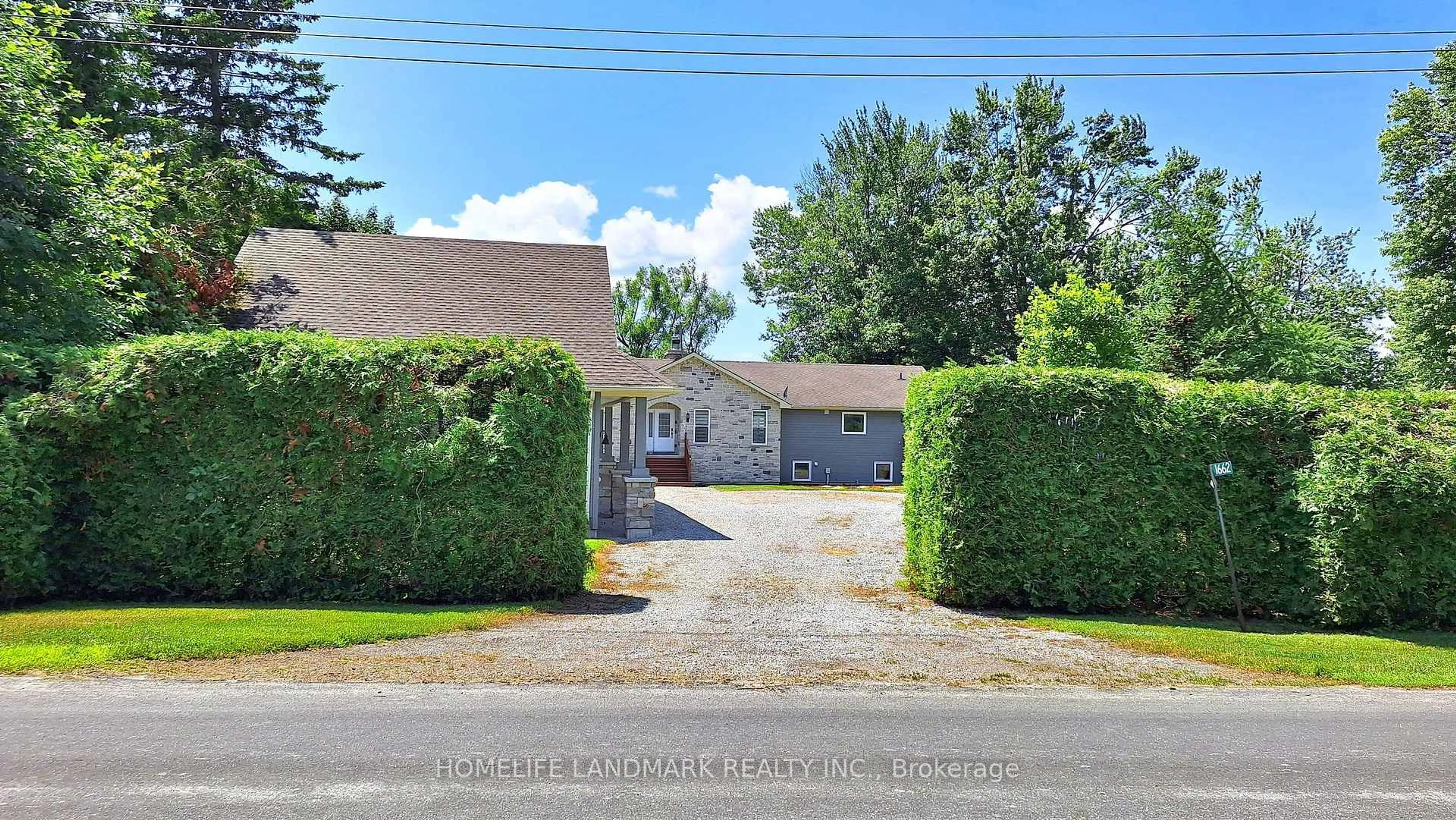 A pic from outside/outdoor area/front of a property/back of a property/a pic from drone, street for 1662 Lakeshore Dr, Ramara Ontario L0K 1B0