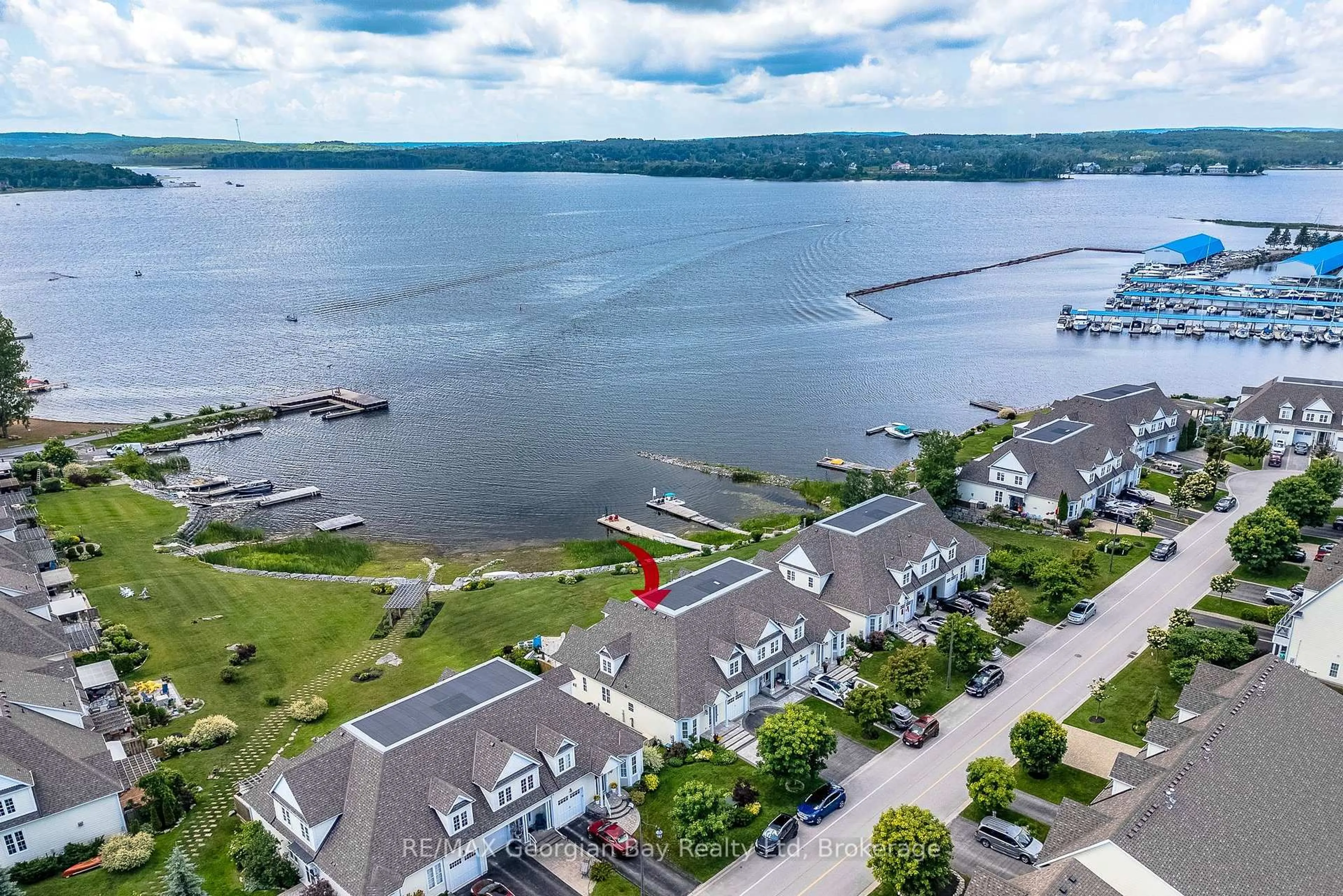 A pic from outside/outdoor area/front of a property/back of a property/a pic from drone, water/lake/river/ocean view for 144 Wycliffe Cove, Tay Ontario L0K 2A0