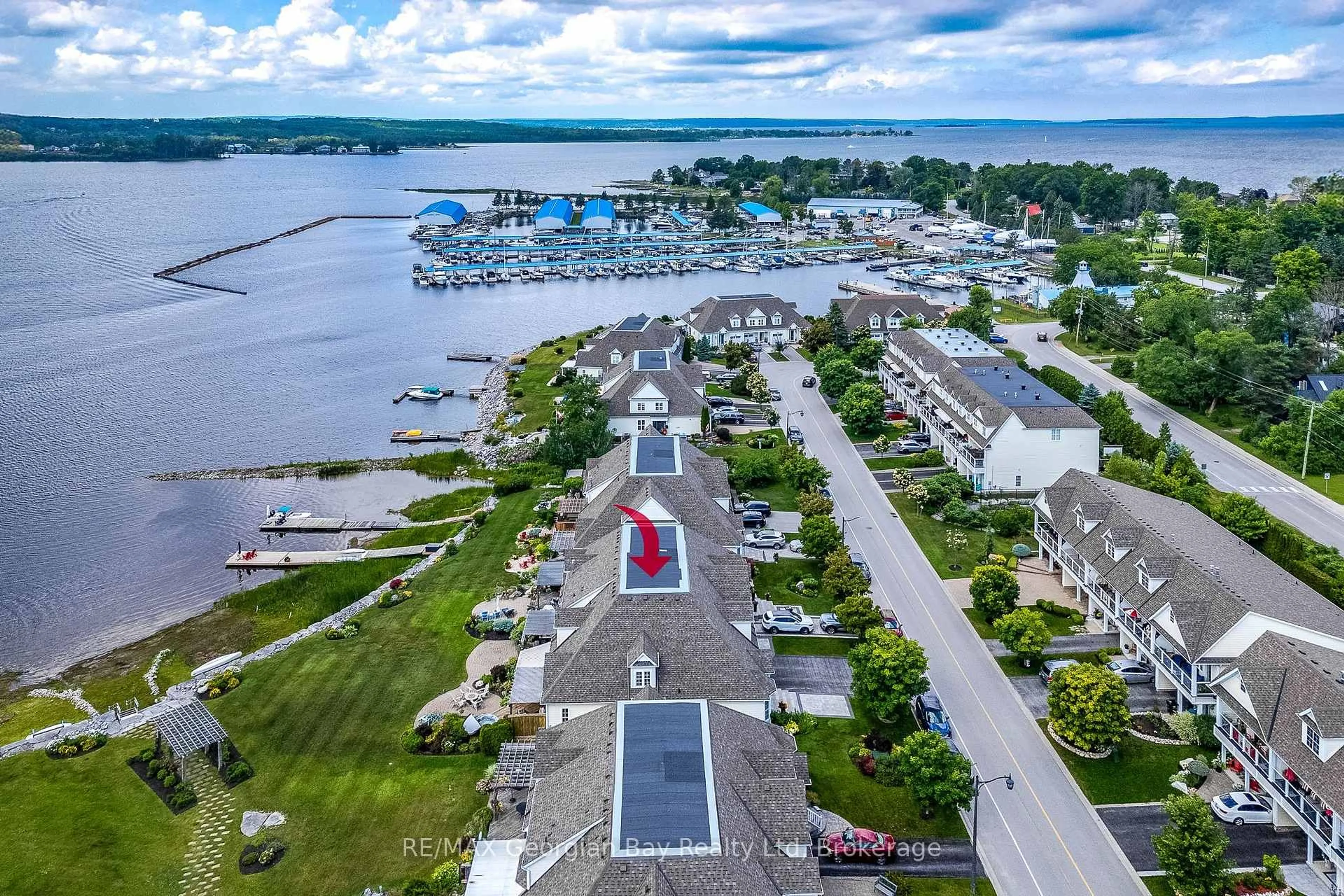 A pic from outside/outdoor area/front of a property/back of a property/a pic from drone, water/lake/river/ocean view for 144 Wycliffe Cove, Tay Ontario L0K 2A0