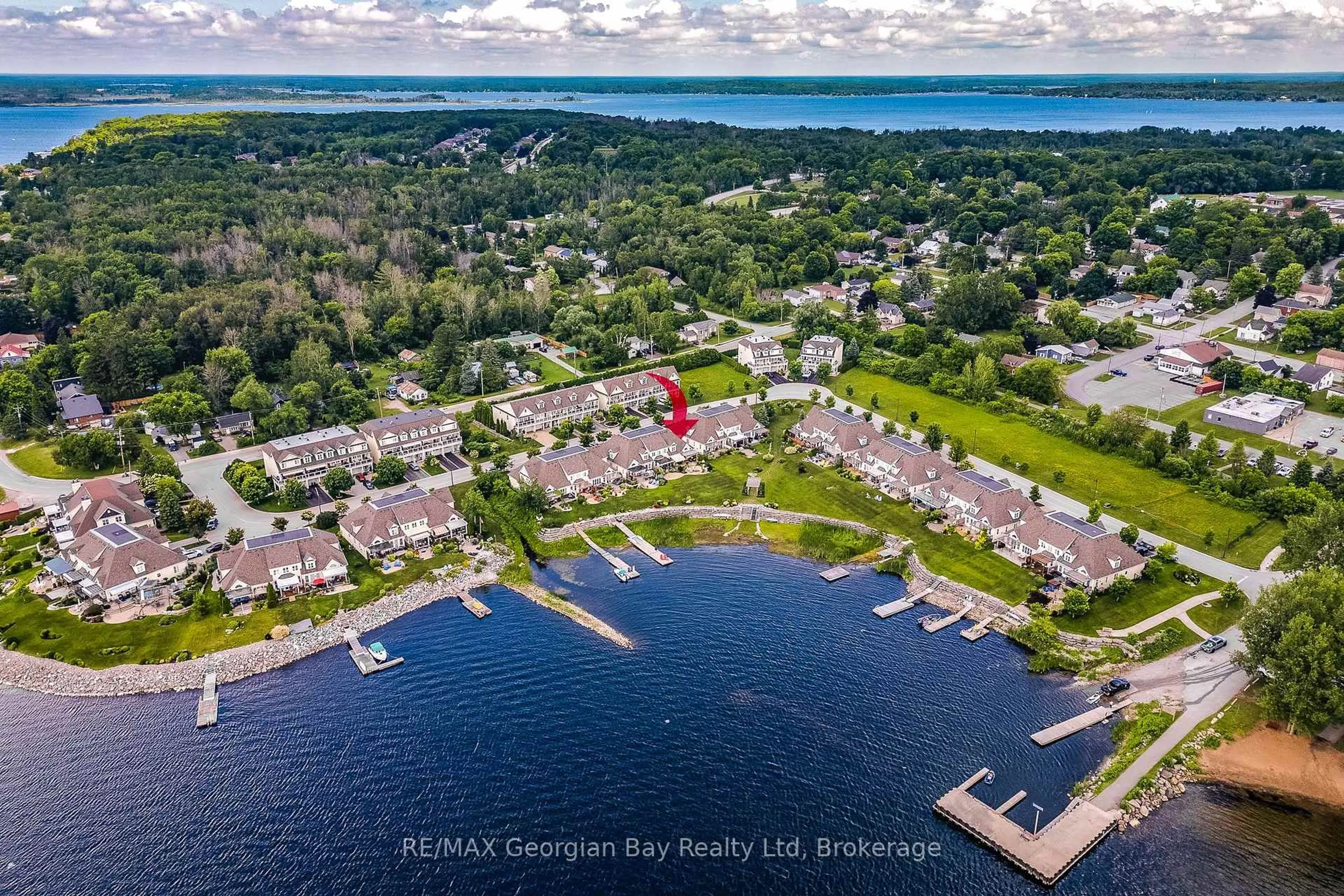 A pic from outside/outdoor area/front of a property/back of a property/a pic from drone, water/lake/river/ocean view for 144 Wycliffe Cove, Tay Ontario L0K 2A0