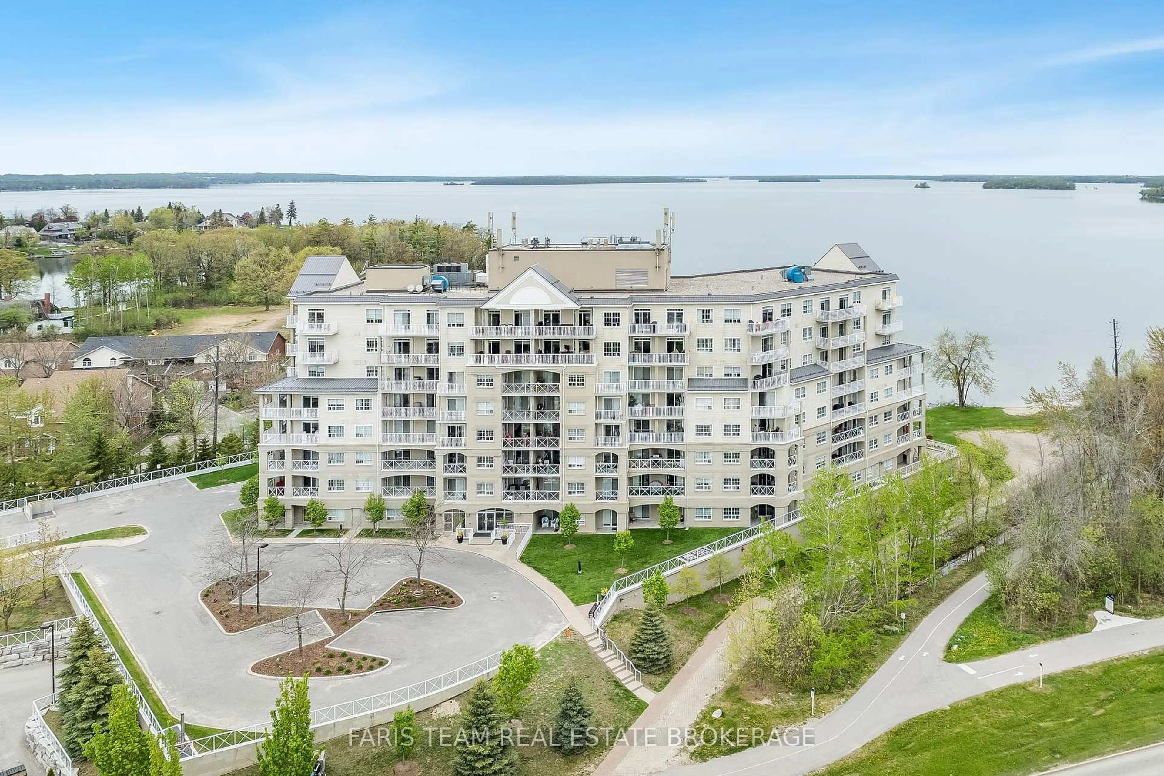 A pic from outside/outdoor area/front of a property/back of a property/a pic from drone, water/lake/river/ocean view for 354 Atherley Rd #214, Orillia Ontario L3V 0B8