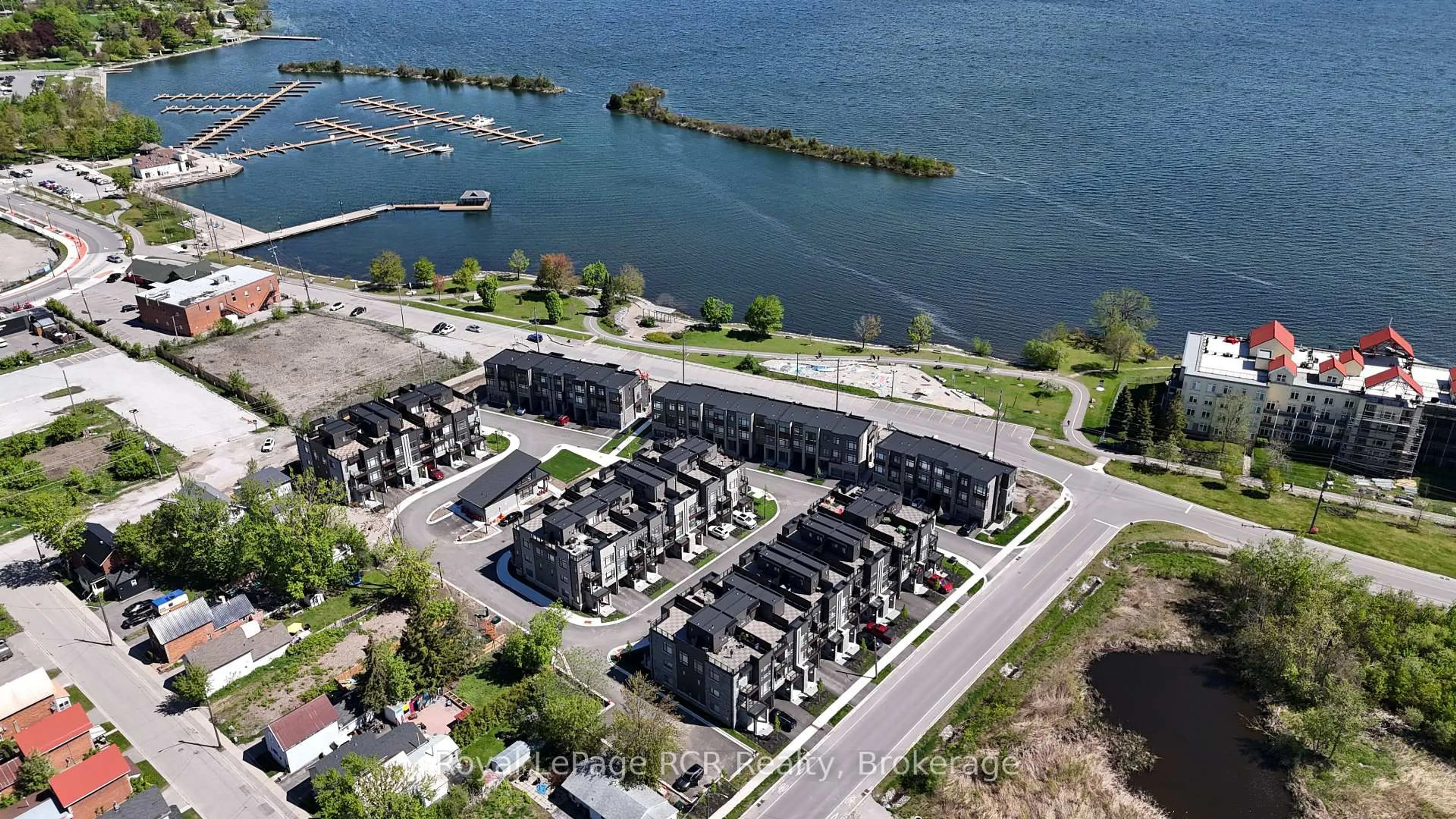 A pic from outside/outdoor area/front of a property/back of a property/a pic from drone, water/lake/river/ocean view for 27 Wyn Wood Lane, Orillia Ontario L3V 8P7