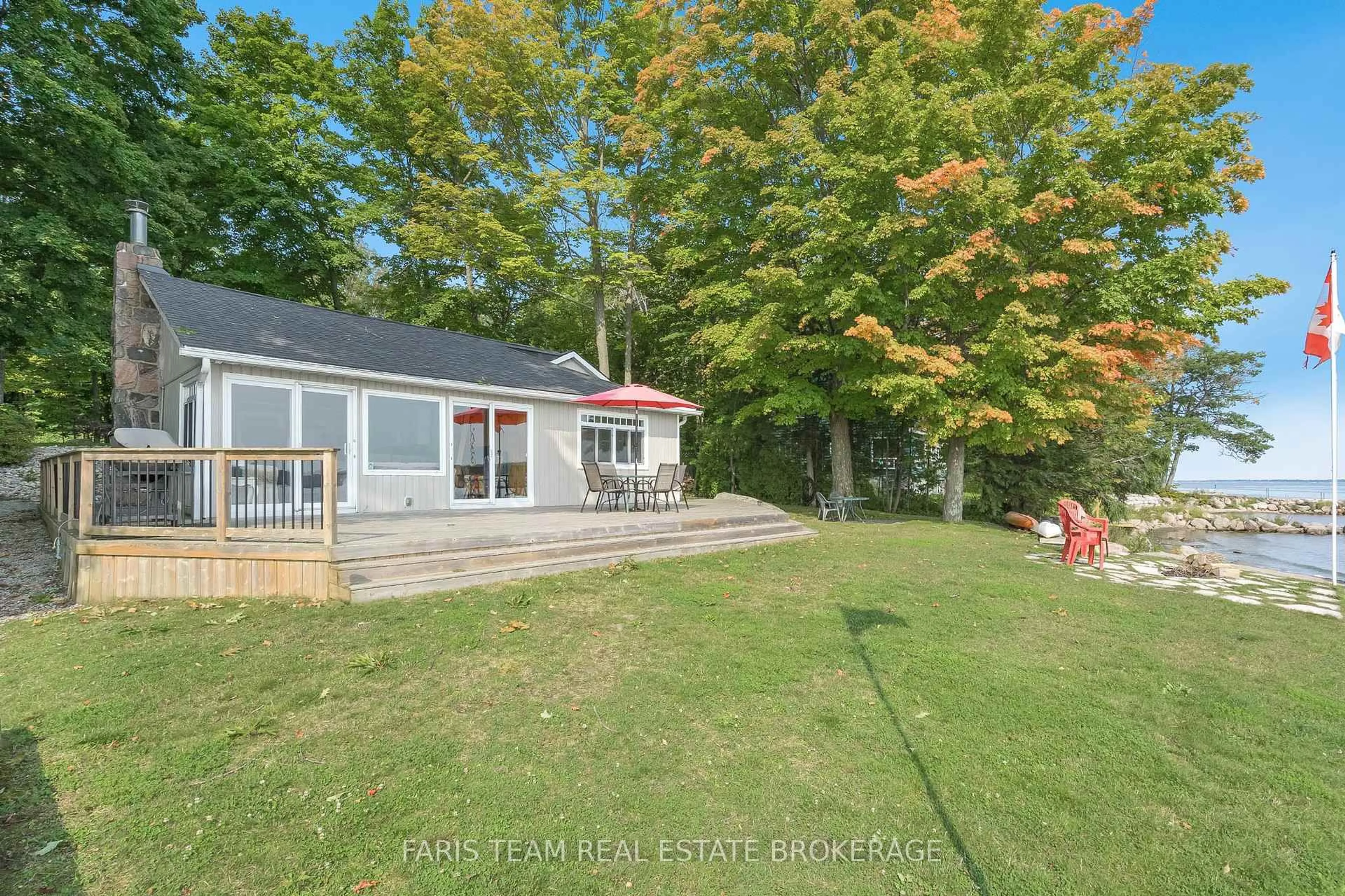 A pic from outside/outdoor area/front of a property/back of a property/a pic from drone, water/lake/river/ocean view for 1449 Champlain Rd, Tiny Ontario L9M 0C1