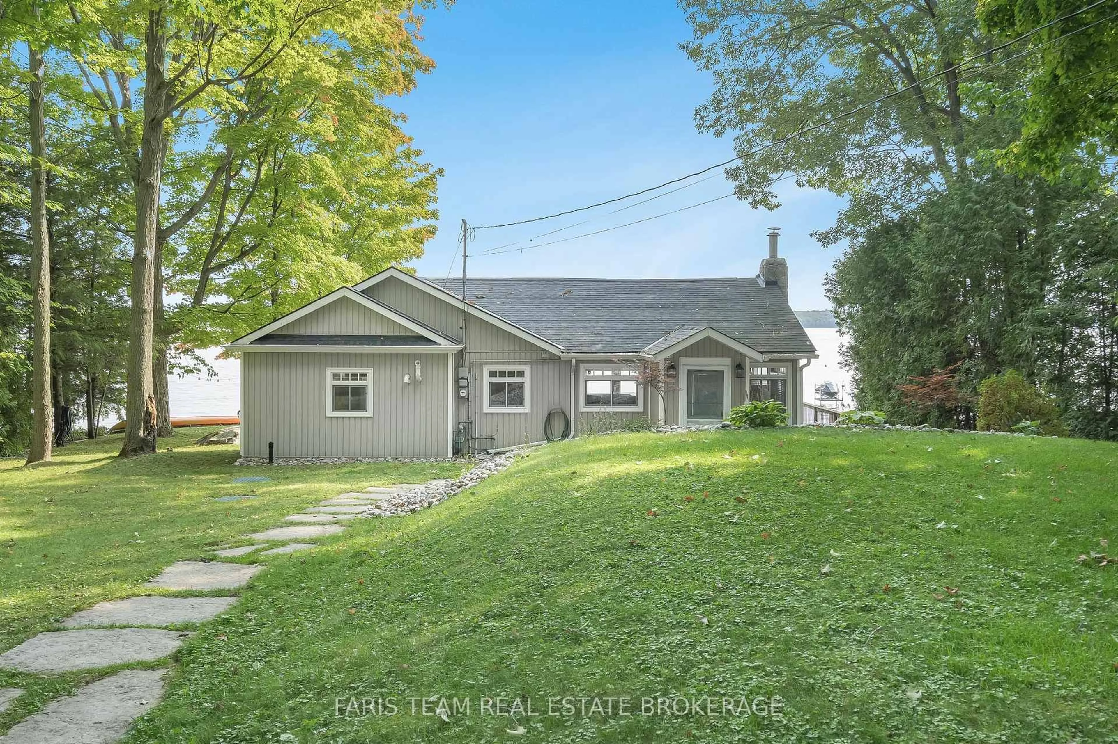 A pic from outside/outdoor area/front of a property/back of a property/a pic from drone, unknown for 1449 Champlain Rd, Tiny Ontario L9M 0C1