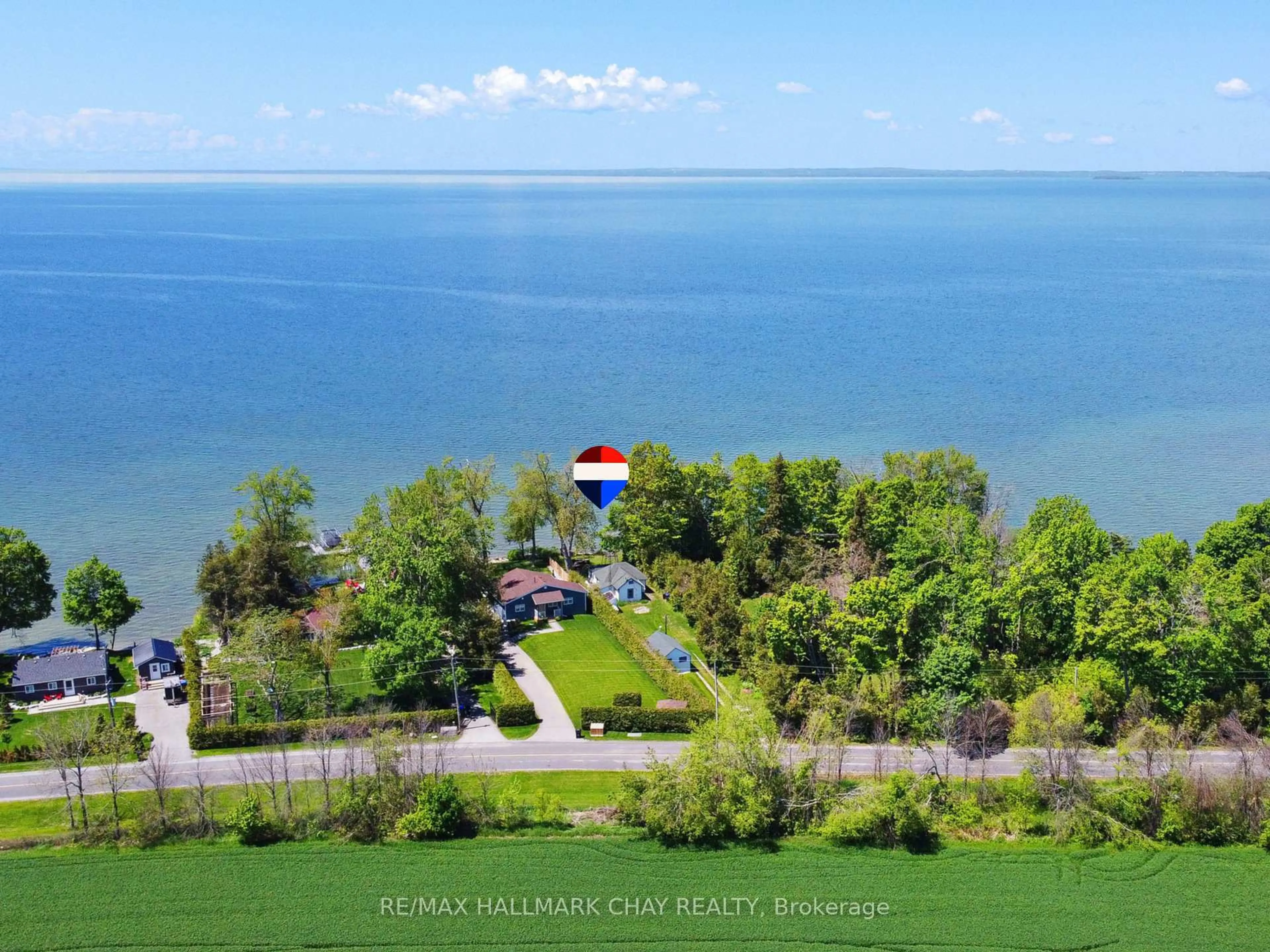 A pic from outside/outdoor area/front of a property/back of a property/a pic from drone, water/lake/river/ocean view for 2196 Lakeshore Dr, Ramara Ontario L0K 1B0