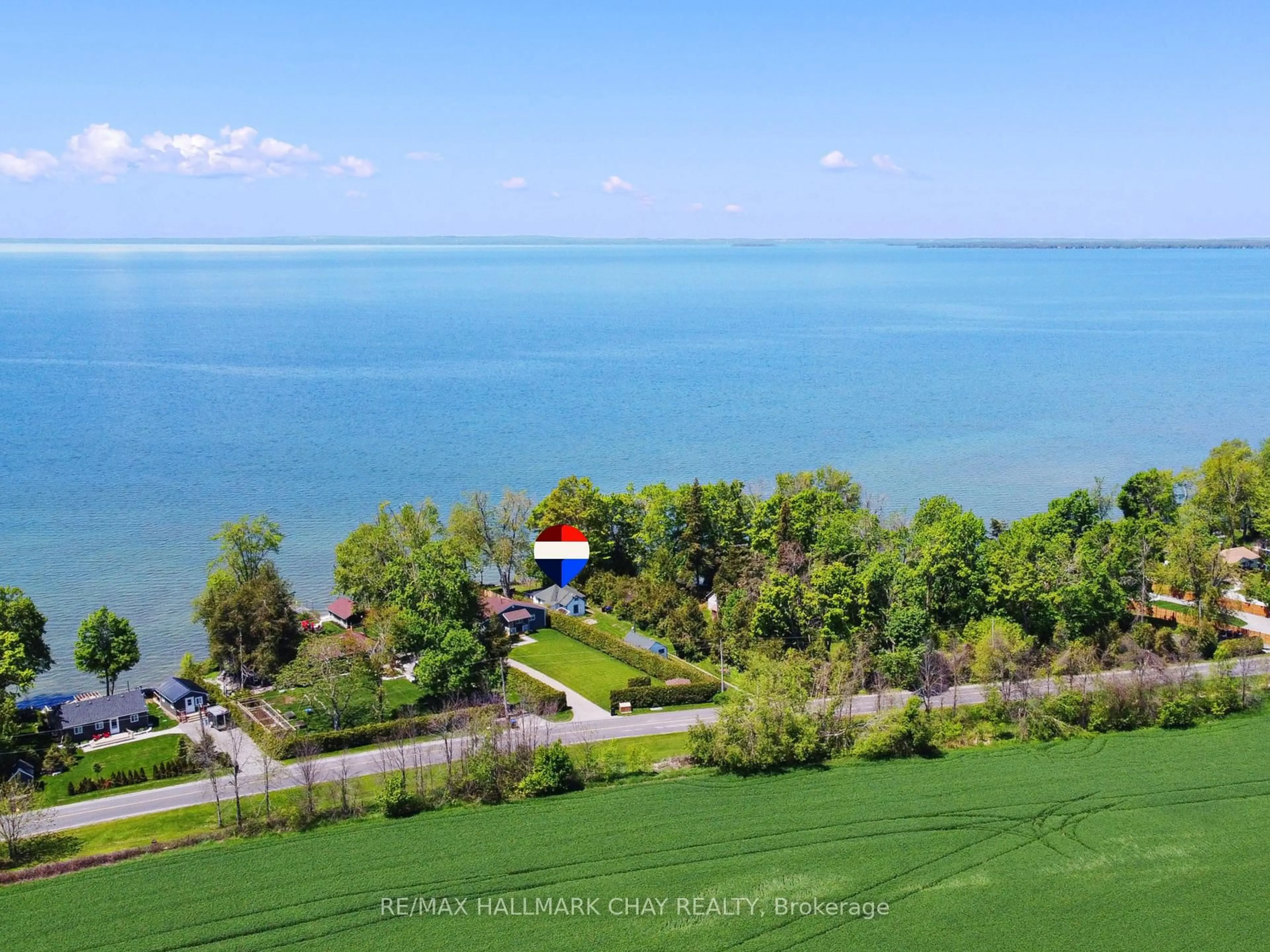 A pic from outside/outdoor area/front of a property/back of a property/a pic from drone, water/lake/river/ocean view for 2196 Lakeshore Dr, Ramara Ontario L0K 1B0