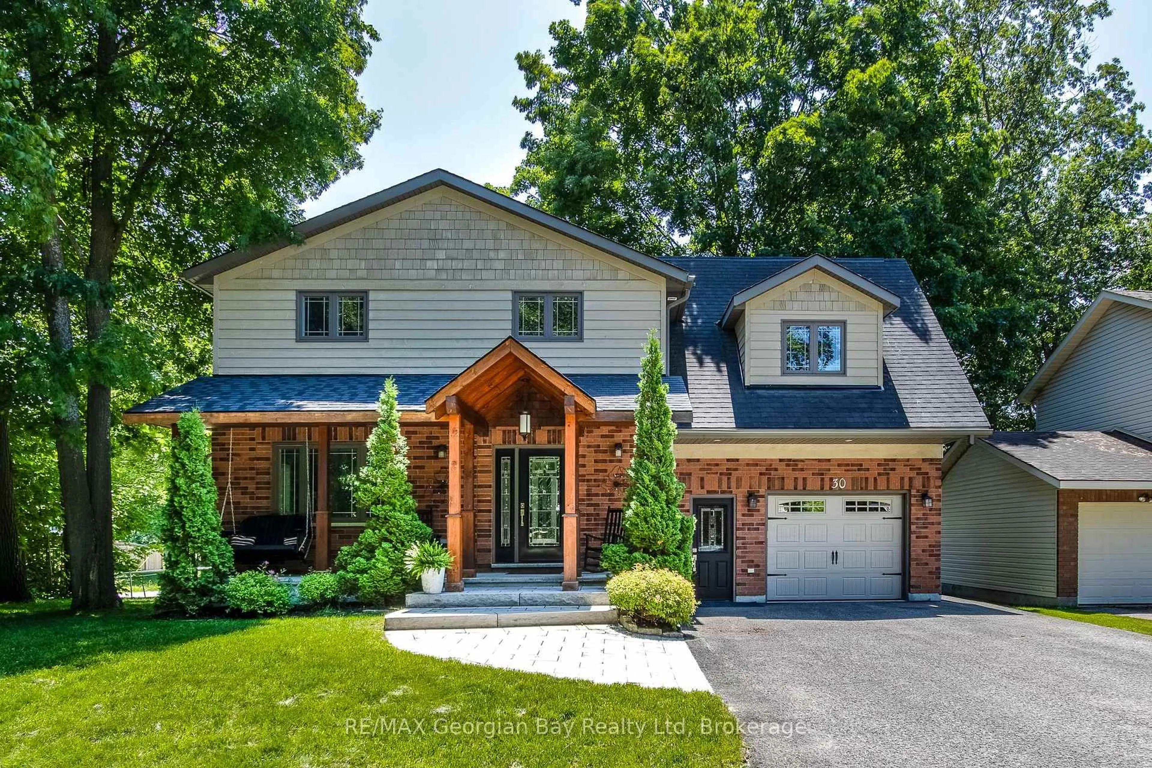 Home with brick exterior material, street for 30 Brule St, Penetanguishene Ontario L9M 1J1