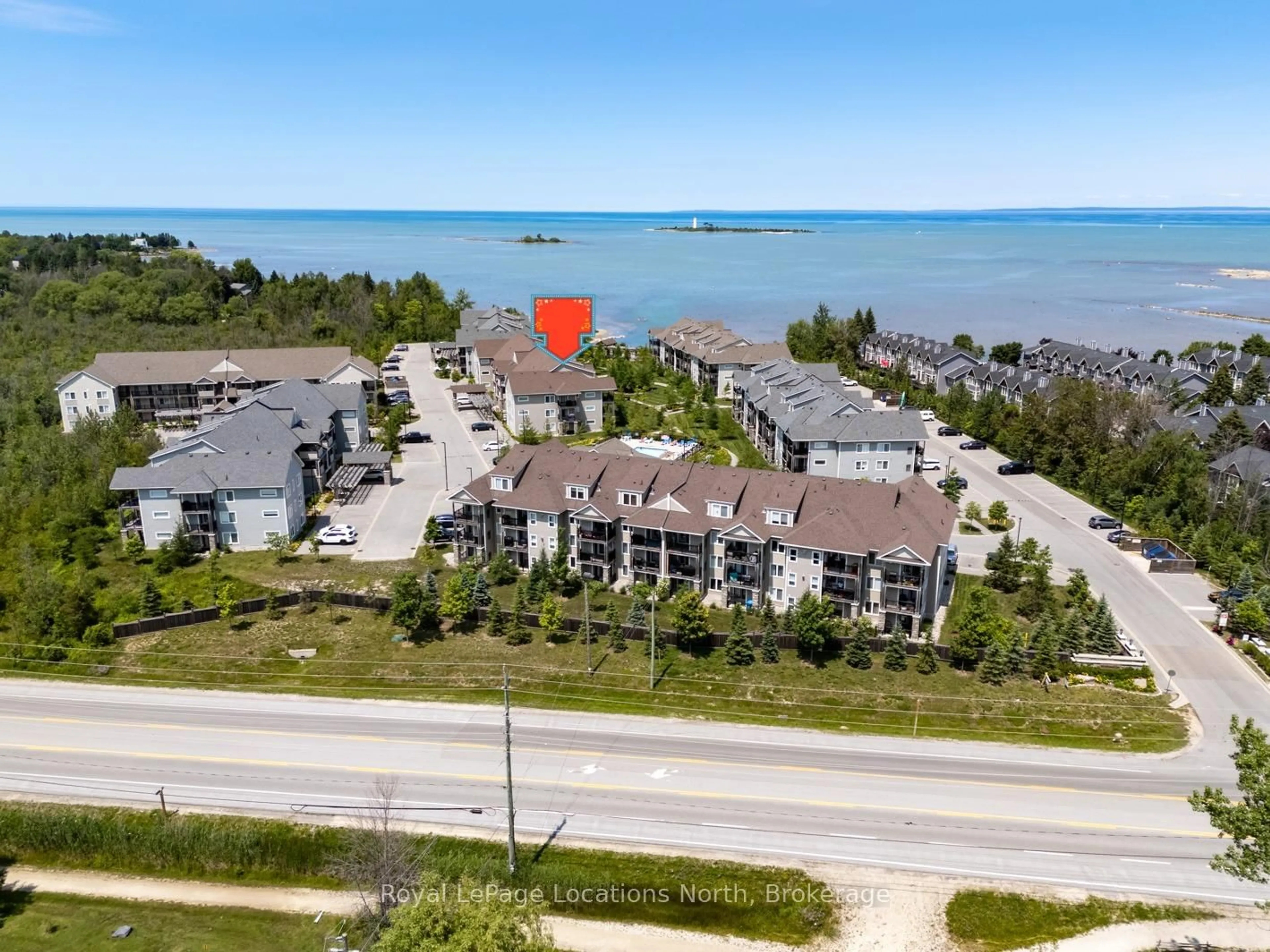 A pic from outside/outdoor area/front of a property/back of a property/a pic from drone, water/lake/river/ocean view for 5 Anchorage Cres #307, Collingwood Ontario L9Y 0Y6