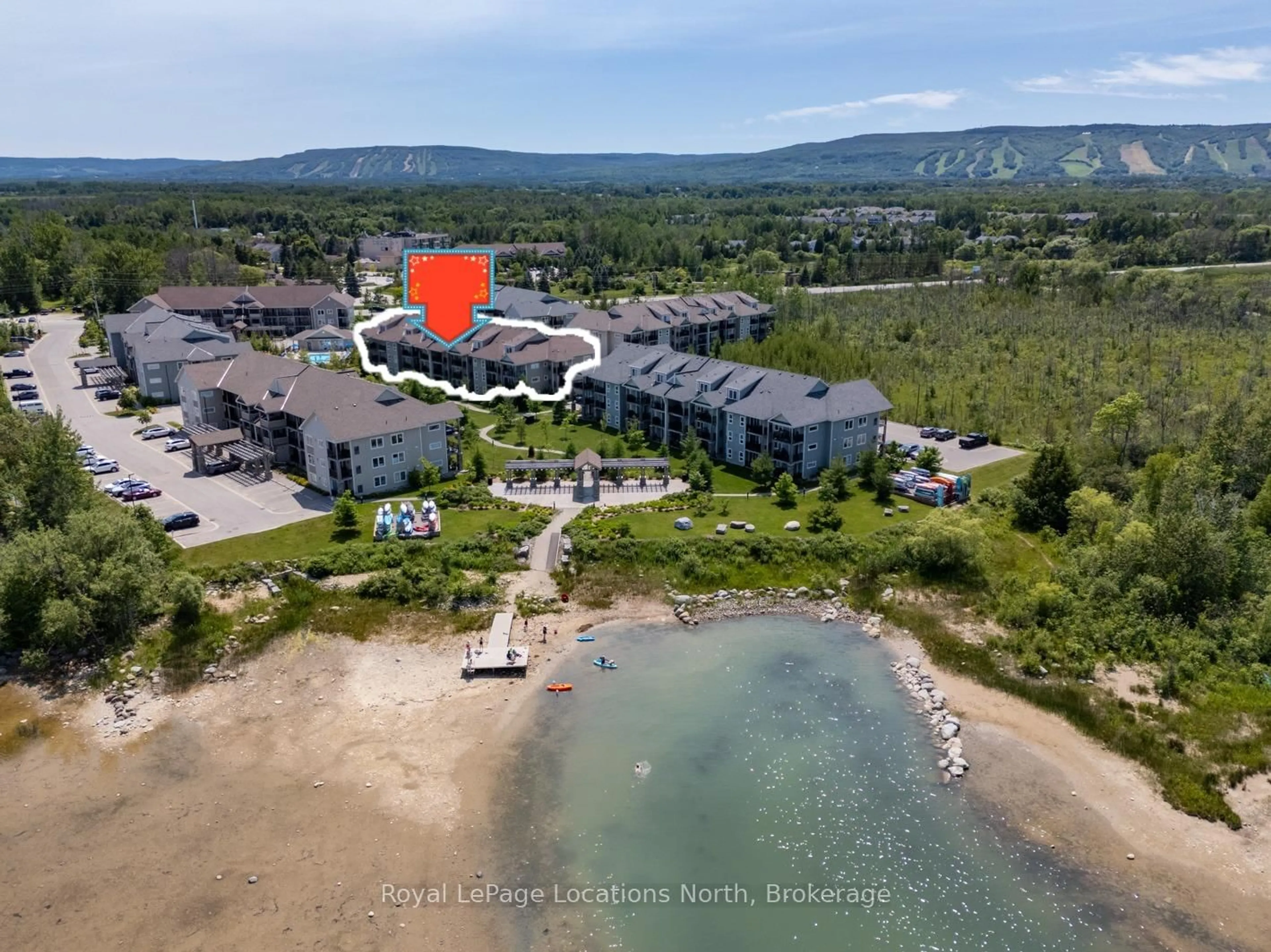 A pic from outside/outdoor area/front of a property/back of a property/a pic from drone, water/lake/river/ocean view for 5 Anchorage Cres #307, Collingwood Ontario L9Y 0Y6