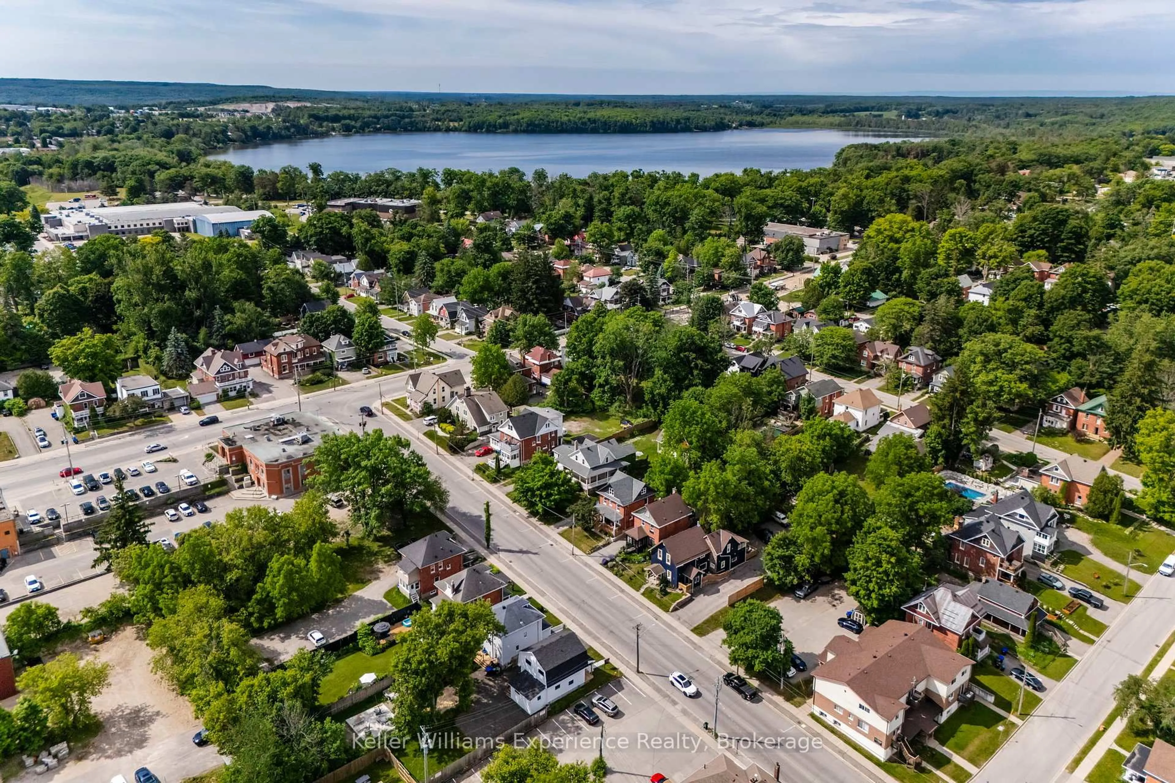 A pic from outside/outdoor area/front of a property/back of a property/a pic from drone, water/lake/river/ocean view for 344 First St, Midland Ontario L4R 3P2