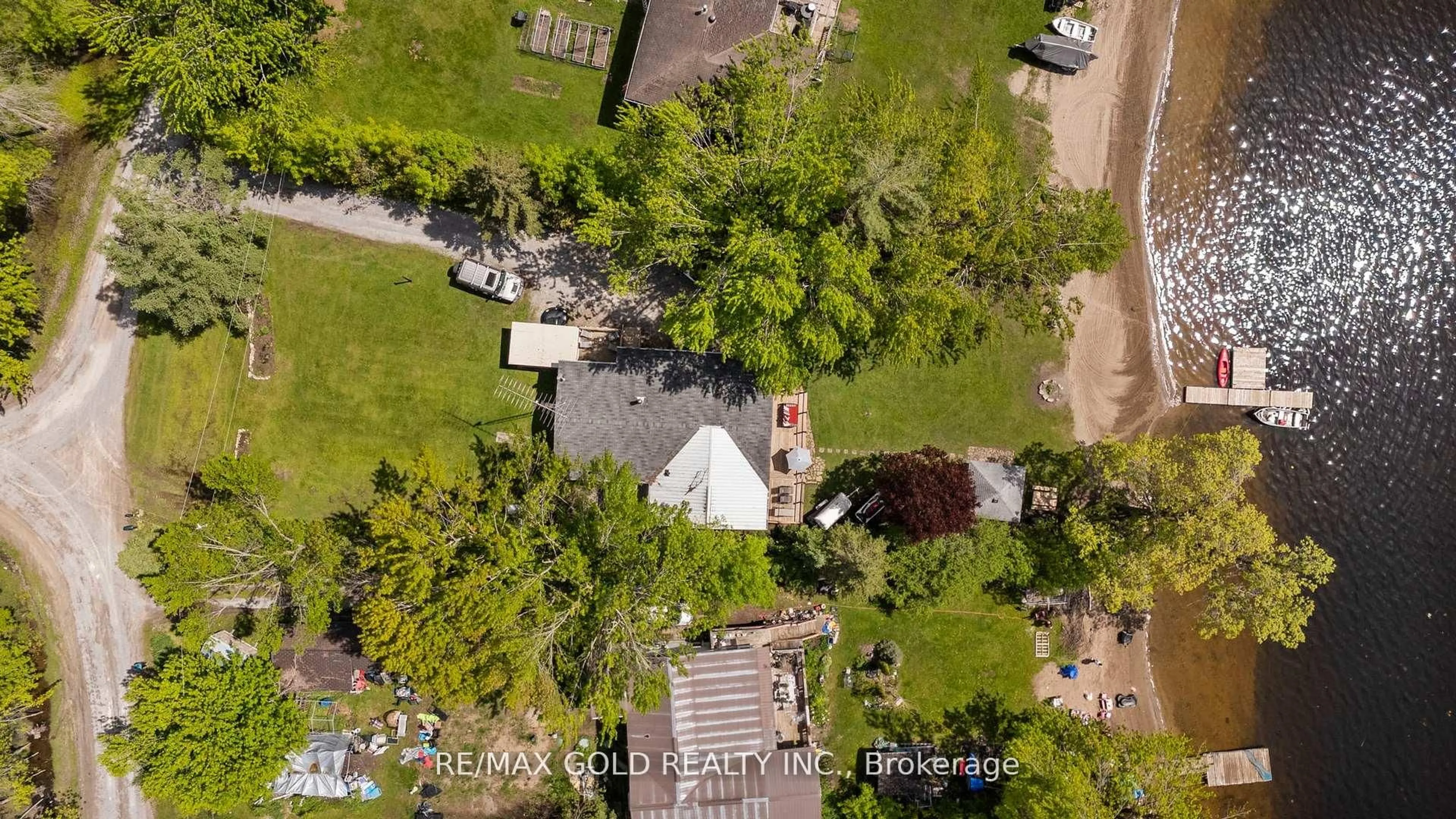 A pic from outside/outdoor area/front of a property/back of a property/a pic from drone, street for 1305 Carol Ann Ave, Ramara Ontario L0K 1B0