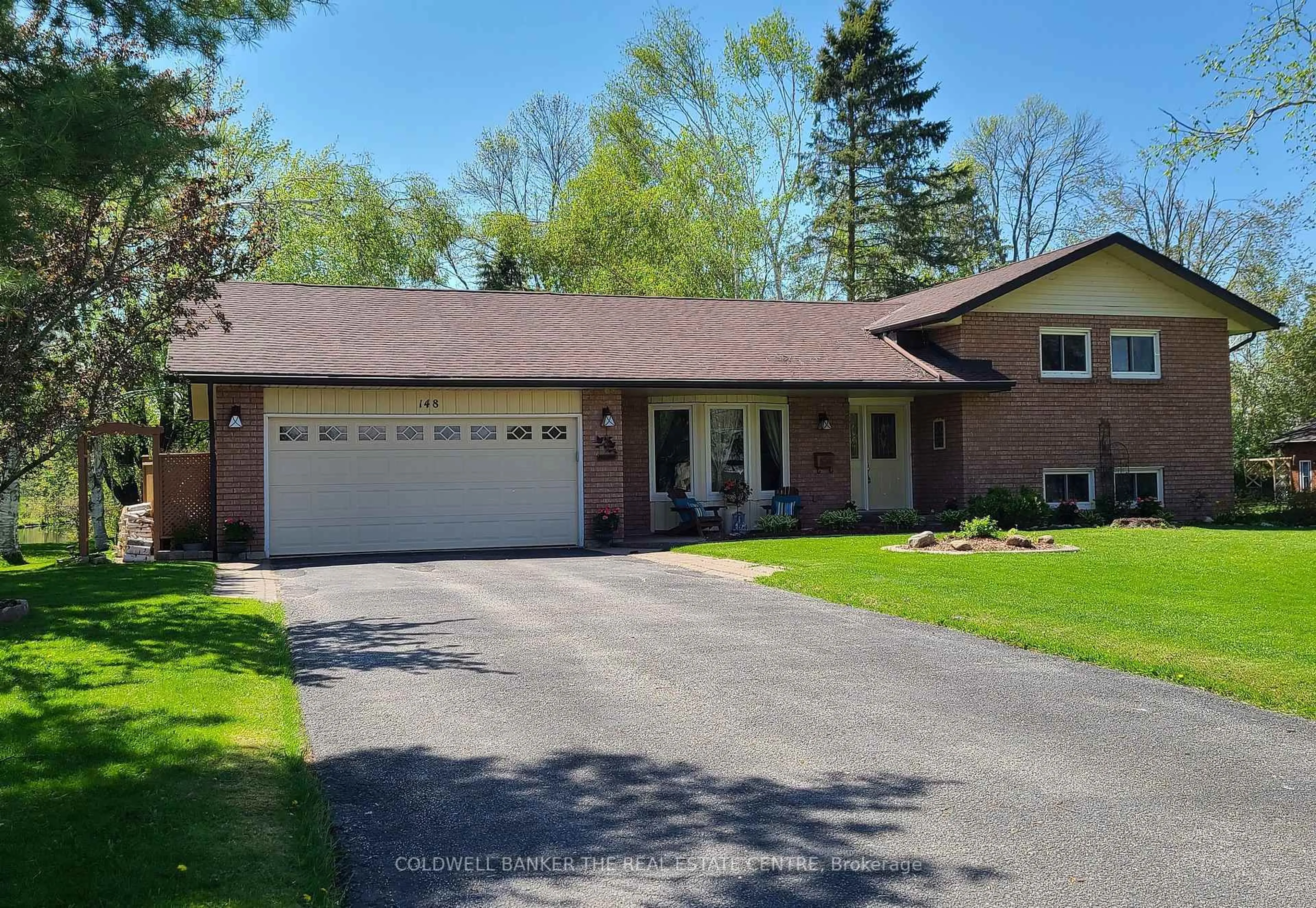 Home with vinyl exterior material, street for 148 Bayshore Dr, Ramara Ontario L0K 1B0