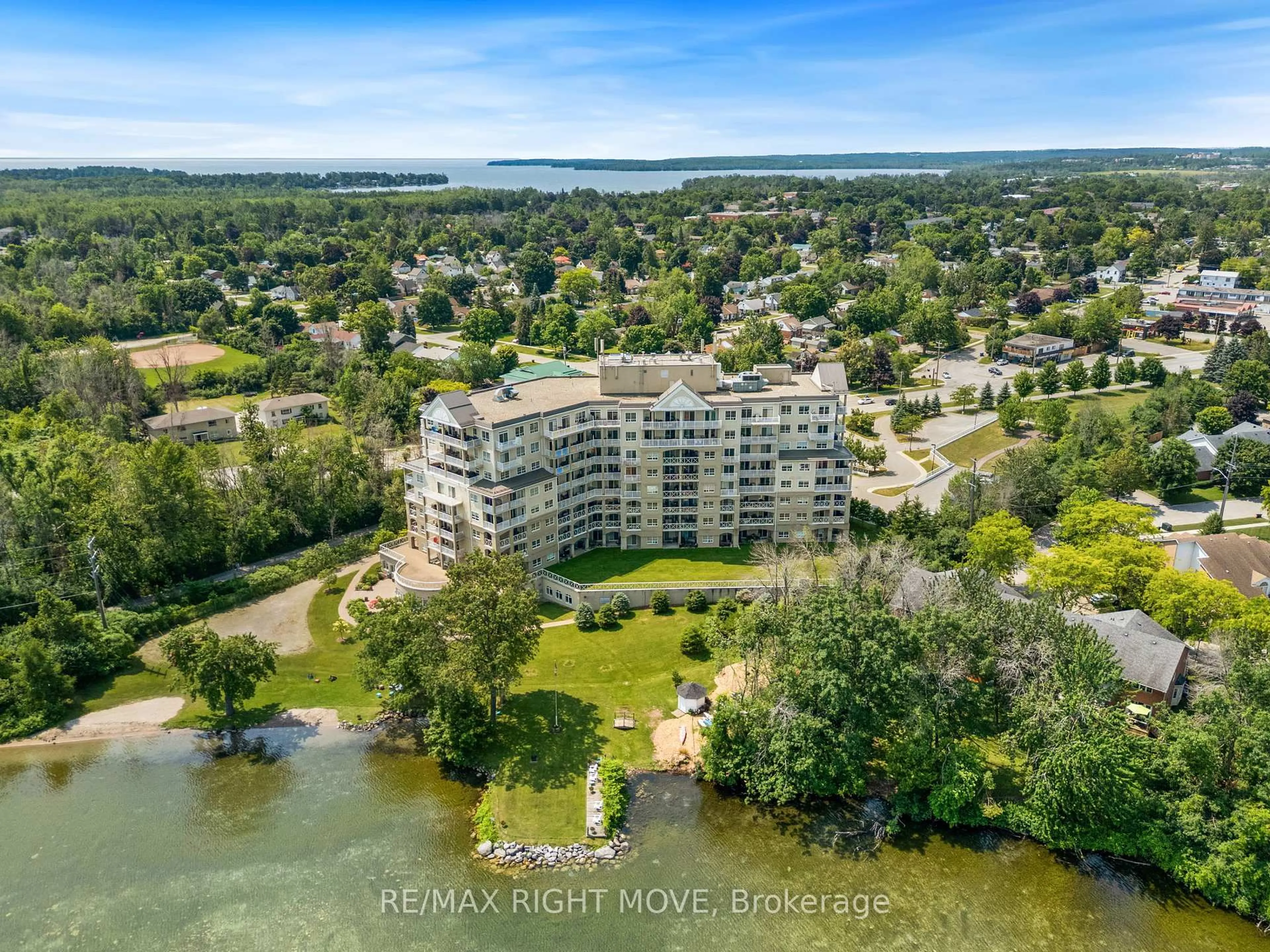 A pic from outside/outdoor area/front of a property/back of a property/a pic from drone, water/lake/river/ocean view for 354 Atherley Rd #806, Orillia Ontario L3V 0B8