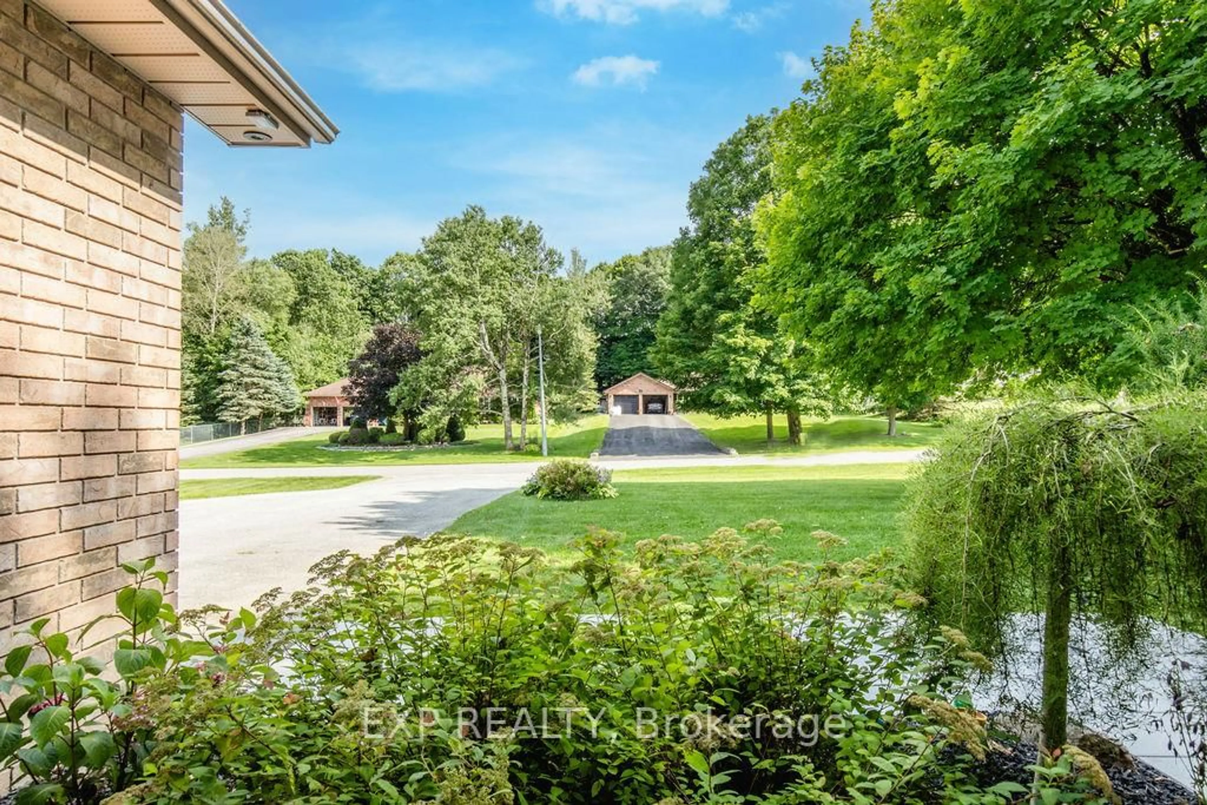 A pic from outside/outdoor area/front of a property/back of a property/a pic from drone, water/lake/river/ocean view for 37 Paddy Dunns Circ, Springwater Ontario L4M 6L9